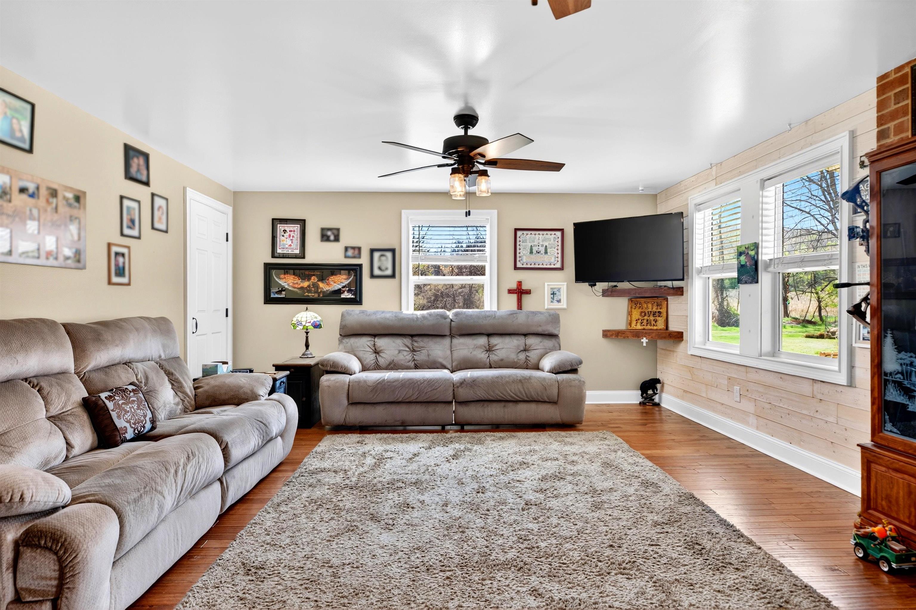 Large family room (approx. 23.5' x 17.9') with plenty of space for gathering, relaxing, and everyday living.