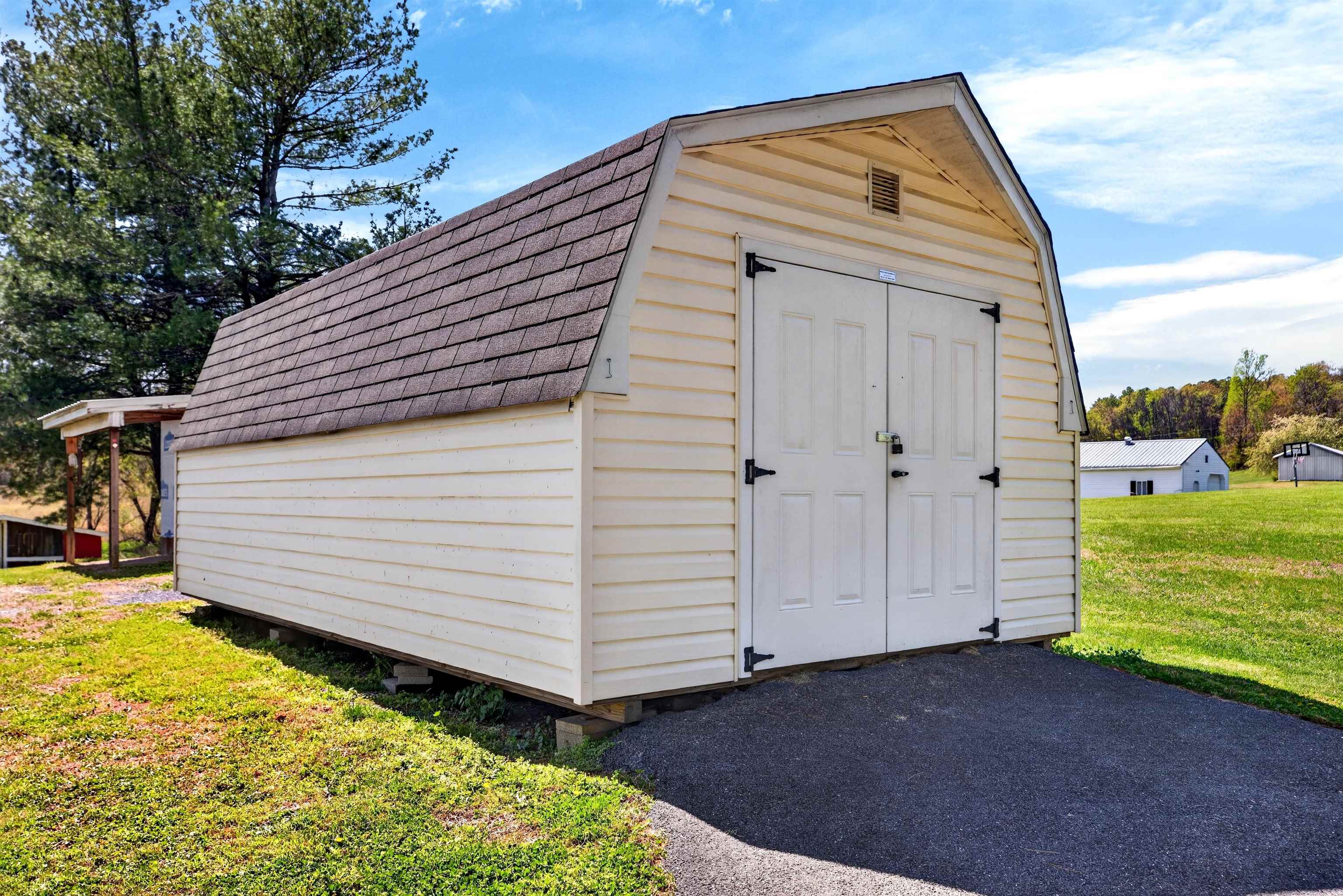 Byler barn conveys with the property, offering additional storage for equipment, tools, or outdoor items.