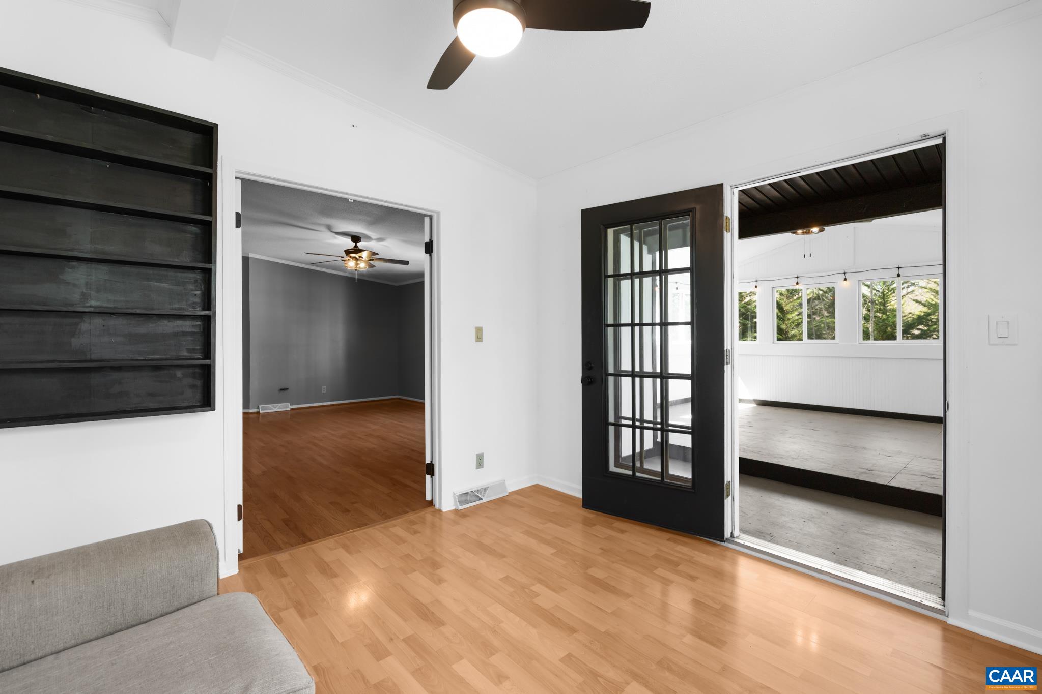 Imagine your sun-drenched sanctuary! This bright office leads directly to a spacious sunroom, perfect for year-round enjoyment. Hardwood floors and great flow. Imagine your sun-drenched sanctuary! This bright office leads directly to a spacious sunroom, perfect for year-round enjoyment. Hardwood floors and great flow.