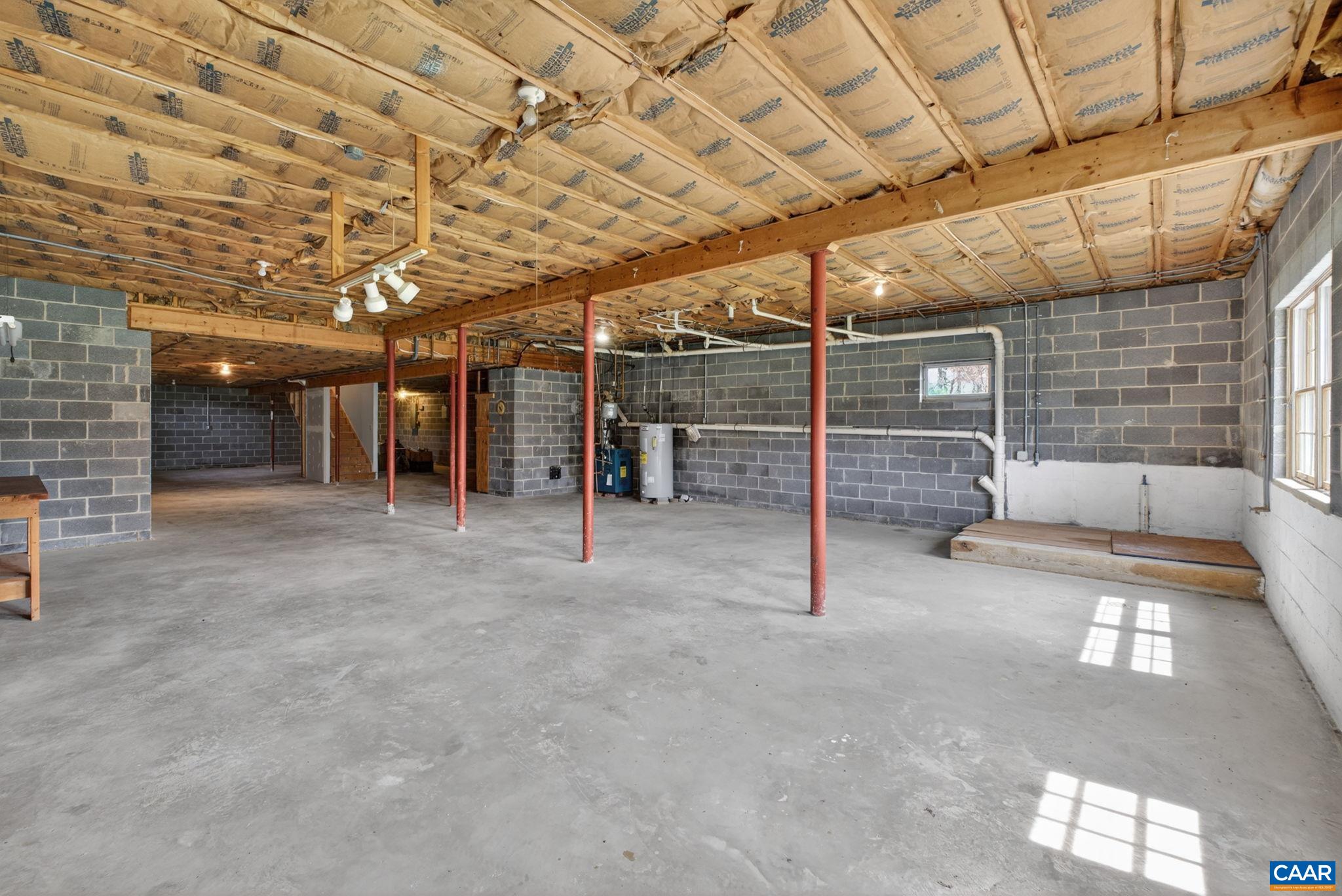 Raised area in the corner is roughed in for bathroom.