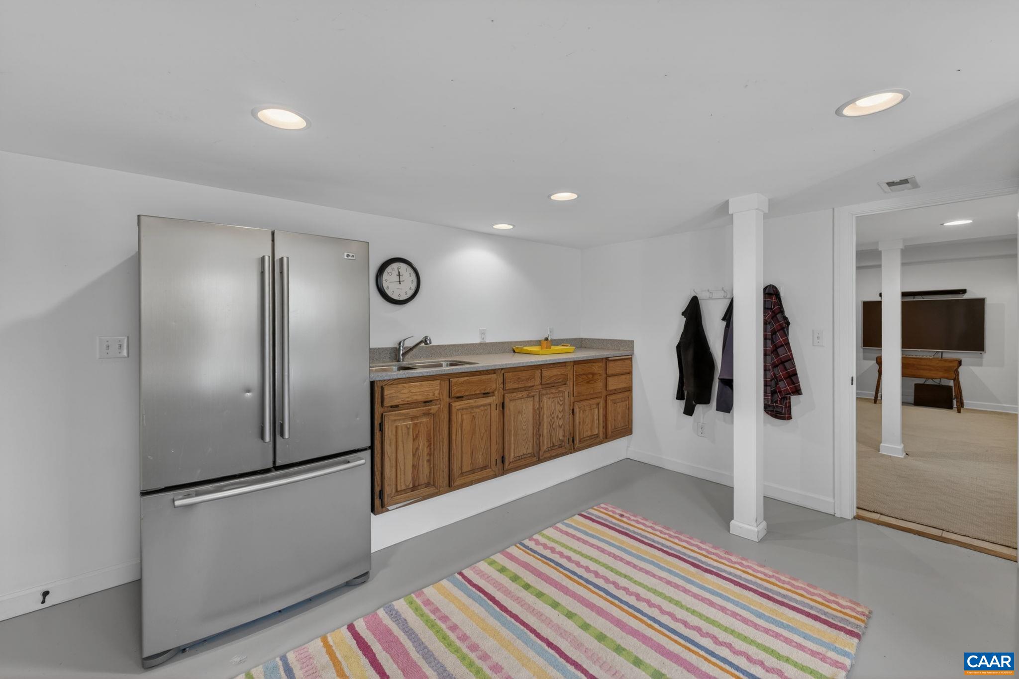 Craft room, overflow fridge/pantry space, gym...