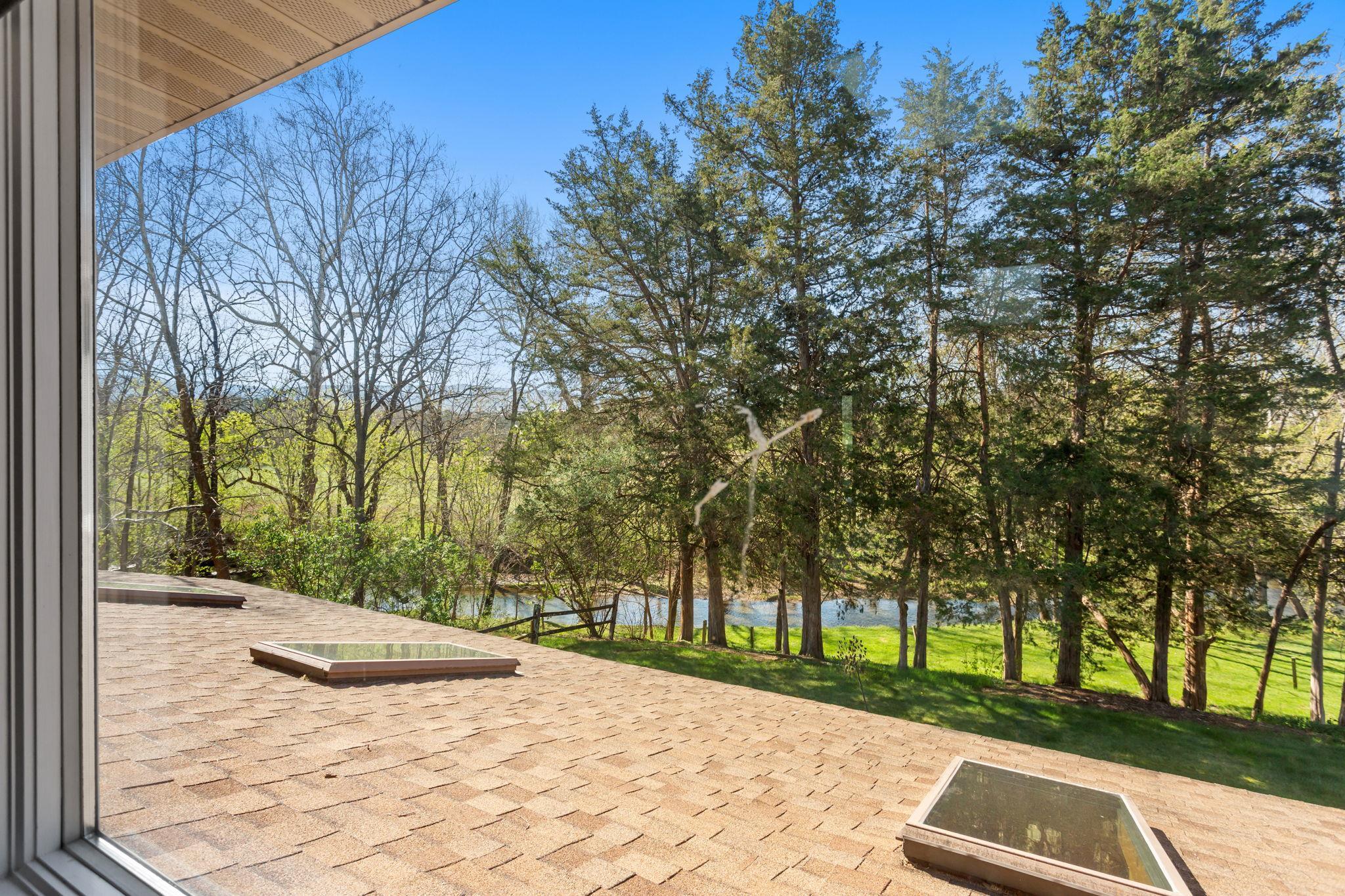 out over the pool room to Smith Creek.