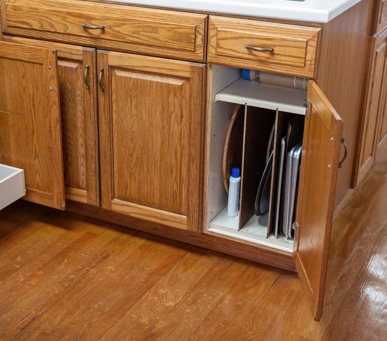 also has baking tin storage.