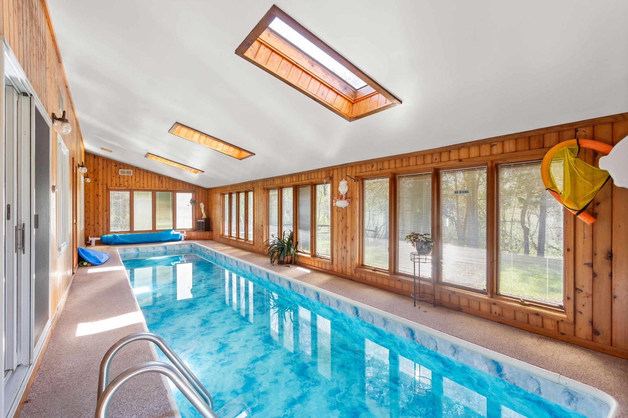 with new liner, heated and skylights off the family room in the lower level.