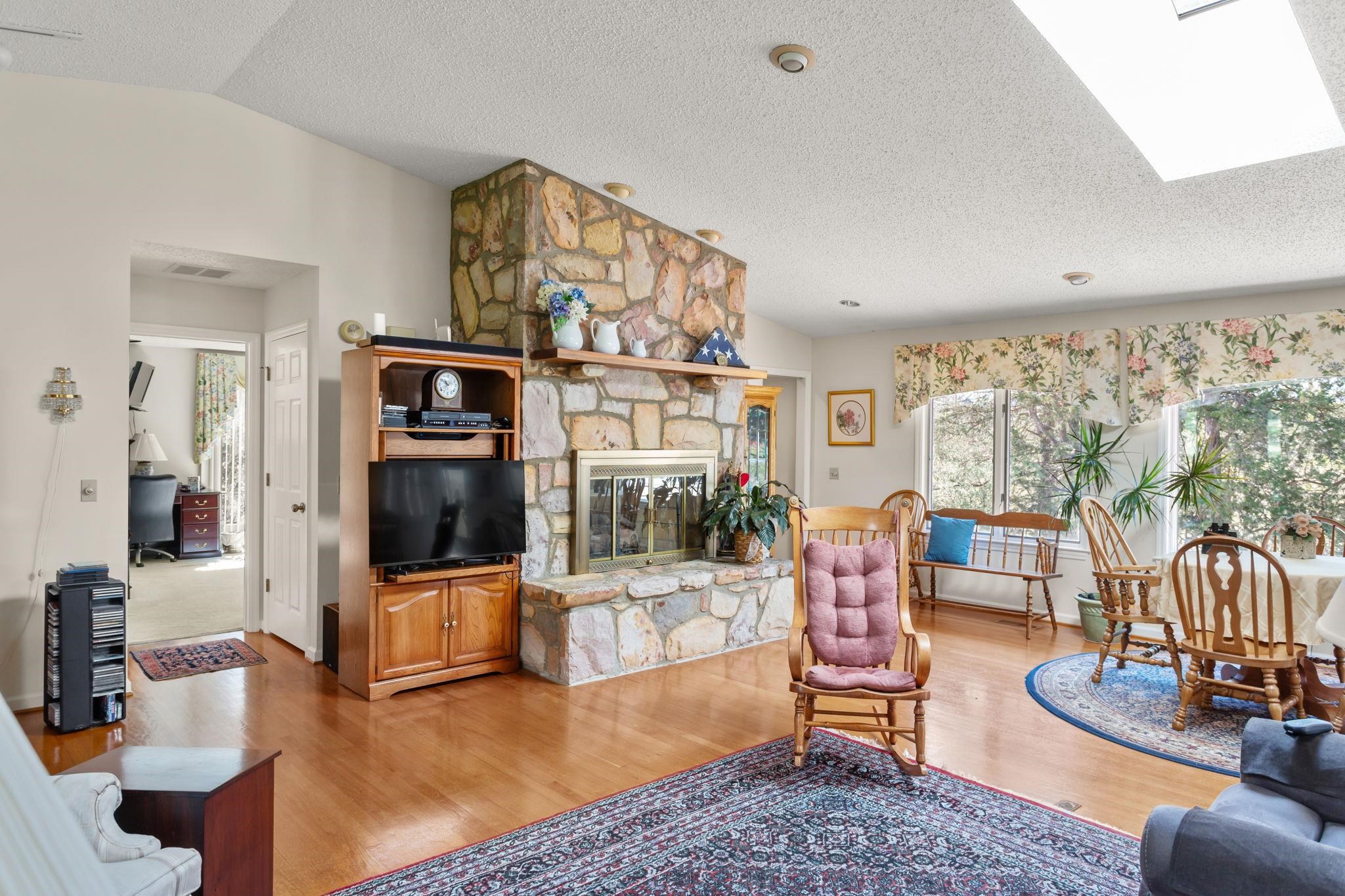 with gas fireplace and vaulted ceiling