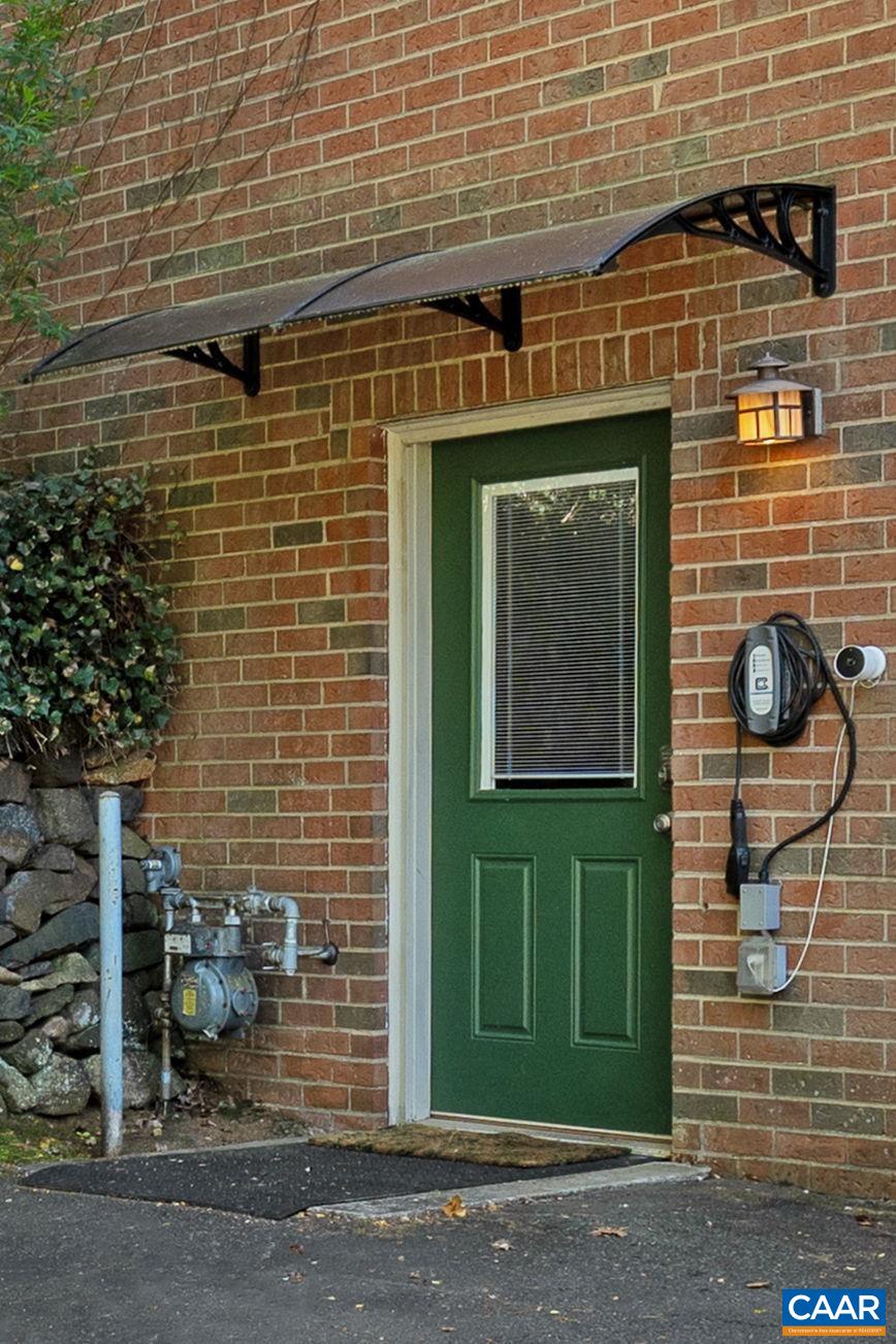 Awning to keep you dry & EV charger installed.