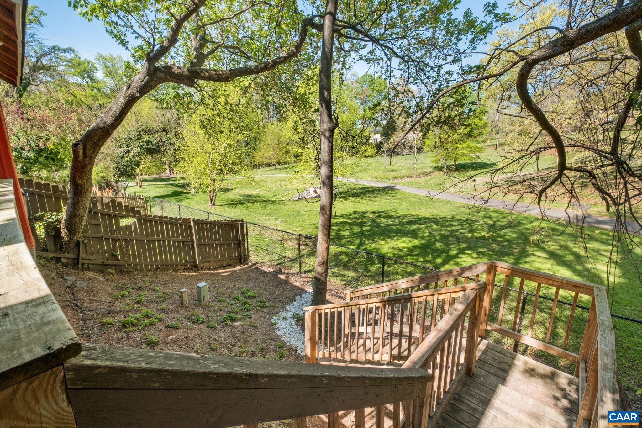 Outdoor entertaining is a dream on this shady multi-tiered deck