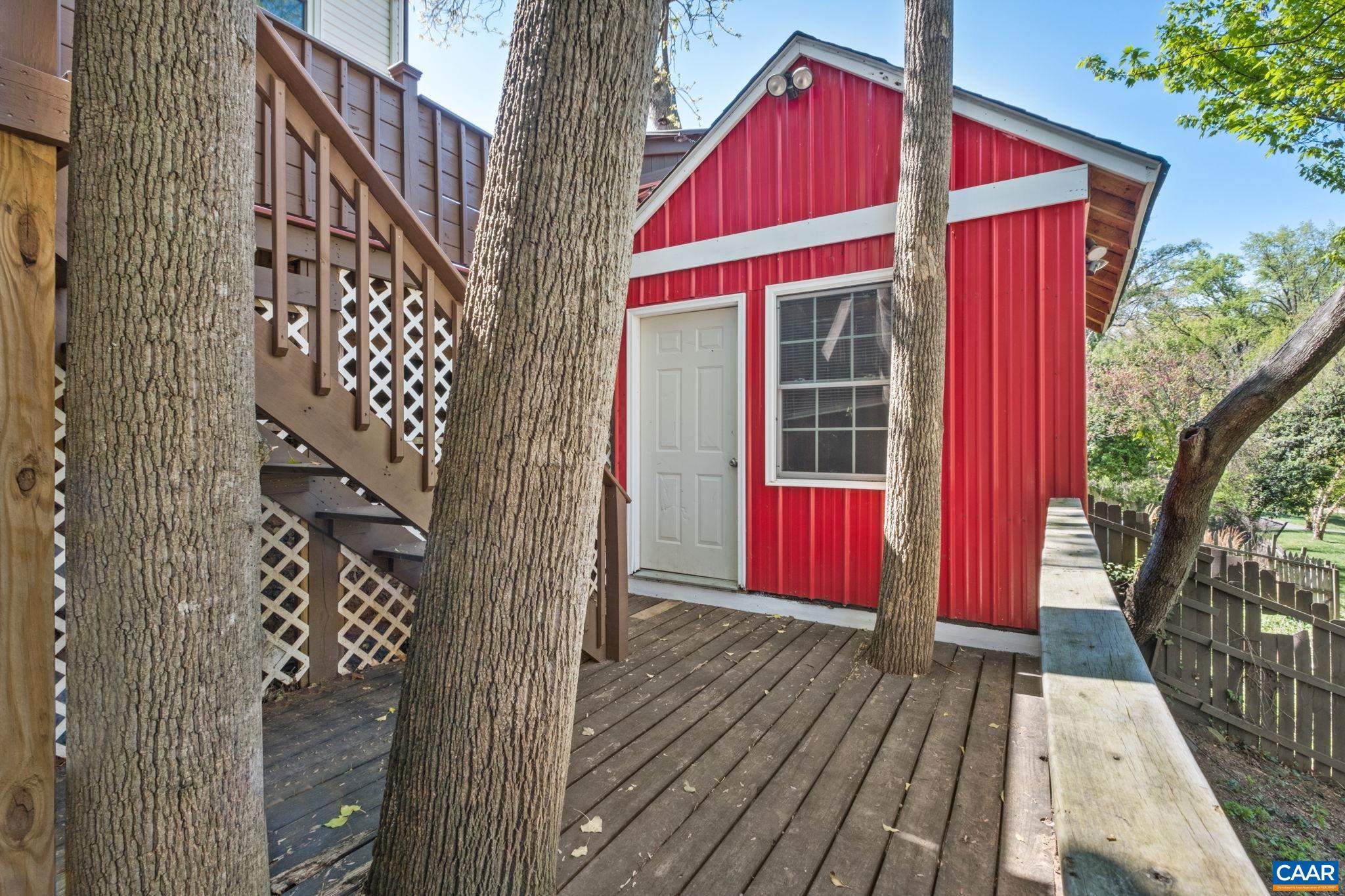 Detached shed with electricals and HVAC could be a home office or workout space.