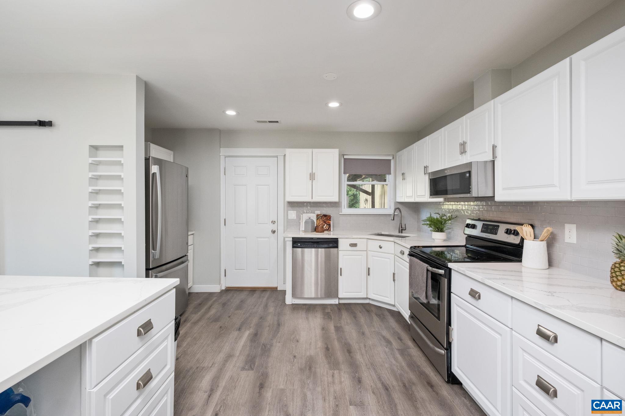 Completely updated home with open kitchen, new flooring and fresh paint!