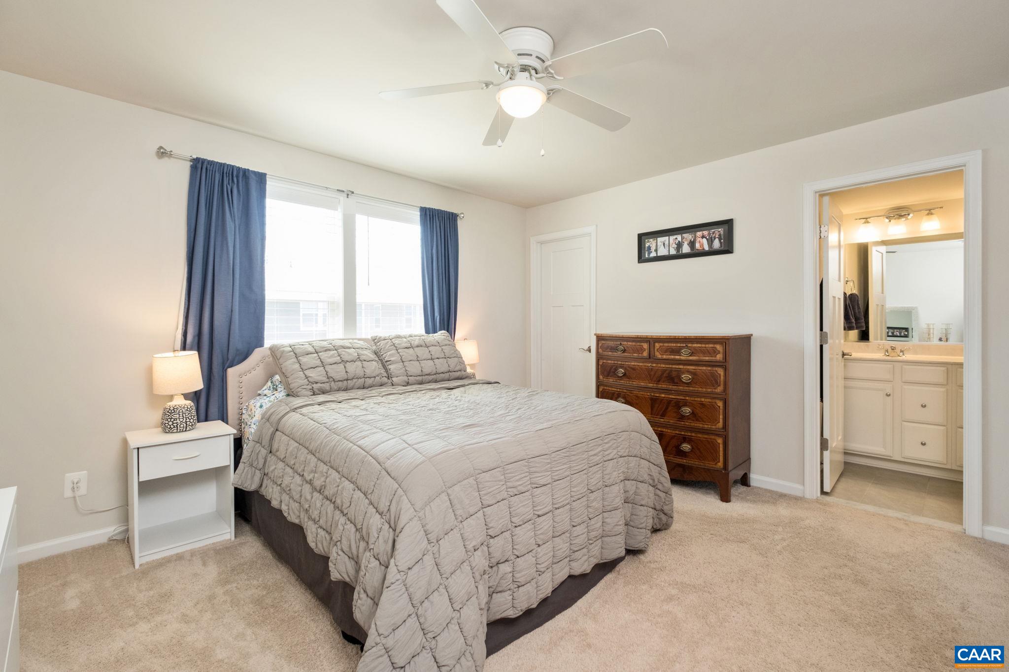 Upstairs the primary suite features a walk in closet and ensuite bathroom.