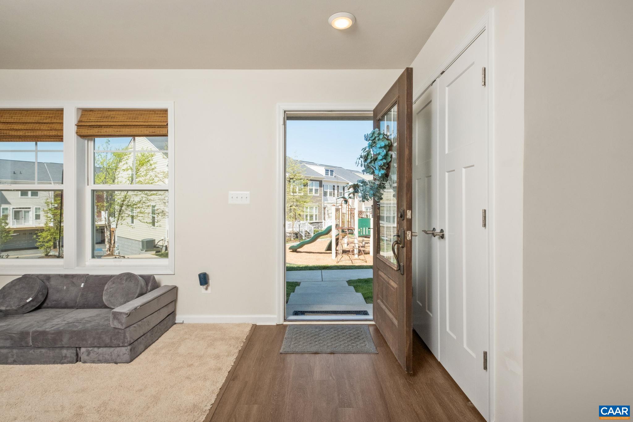 Luxury vinyl flooring in the entry way and main level and neutral paint throughout the home.