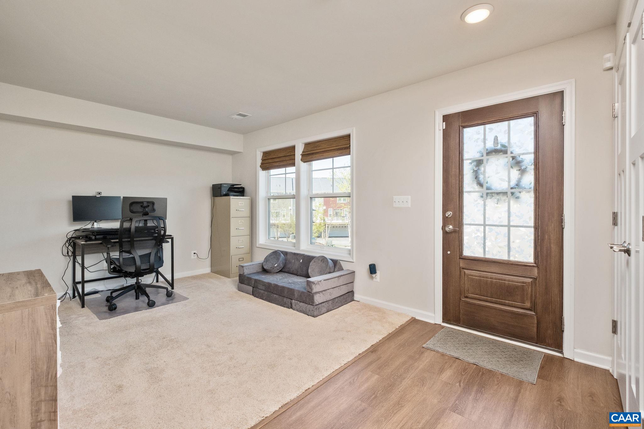 Large flexible room on the main level could be an office, playroom or guest suite!