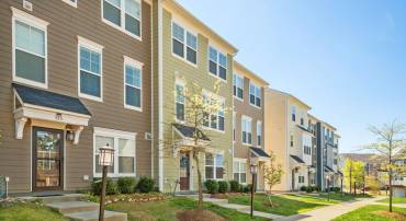 Like-new townhome is walkable to Holllymead shopping center!