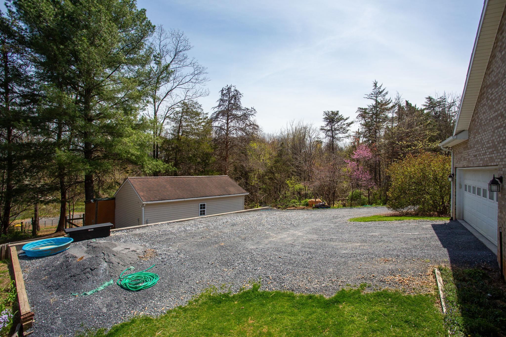 with detached garage below.