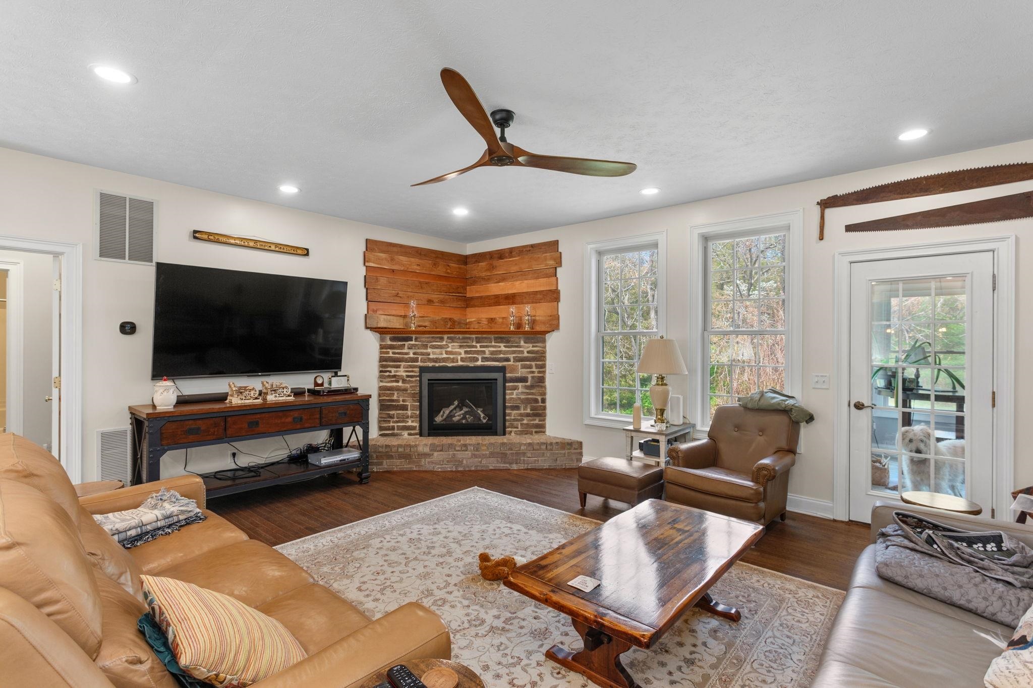 off the kitchen with gas fireplace.