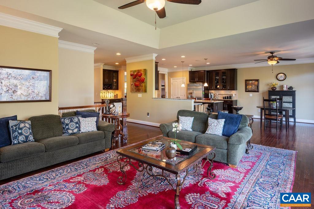 Nice open floor plan between the living room, breakfast room, and kitchen gives a spacious feel.