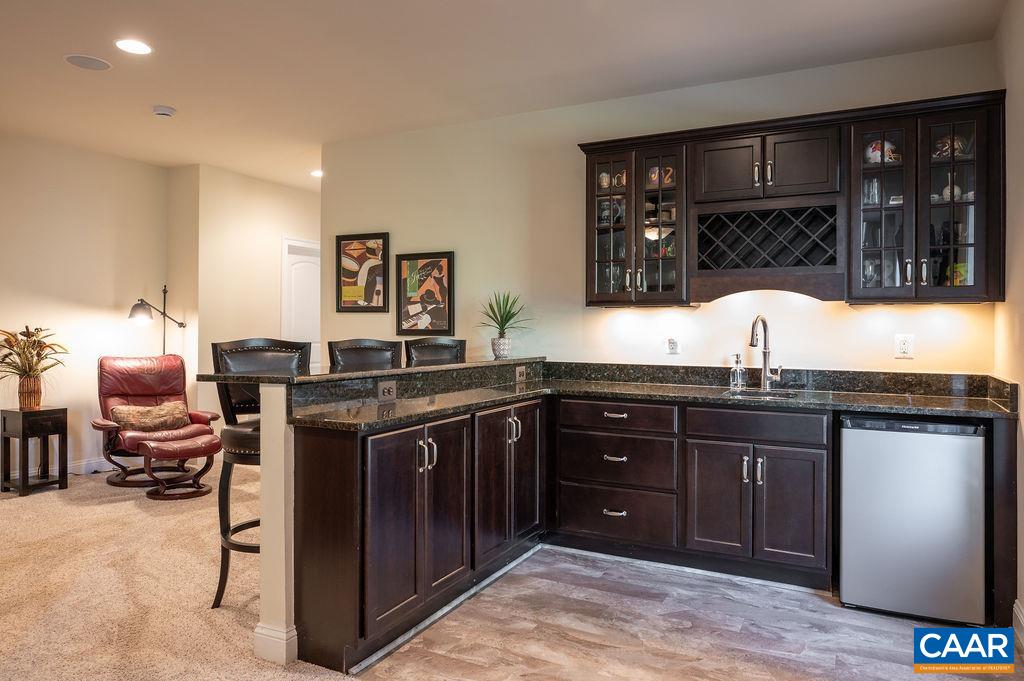 Wet bar includes a mini fridge