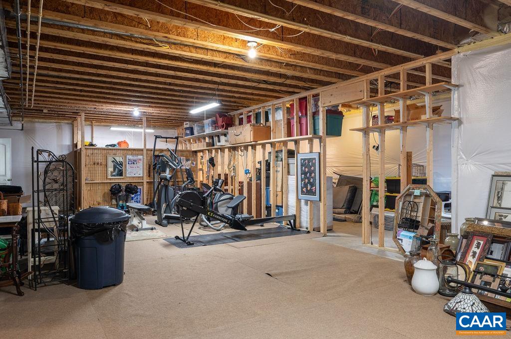 Large conditioned unfinished space has been used as a game room, exercise space, and dry storage. There is also a pet enclosure (currently used for storage).