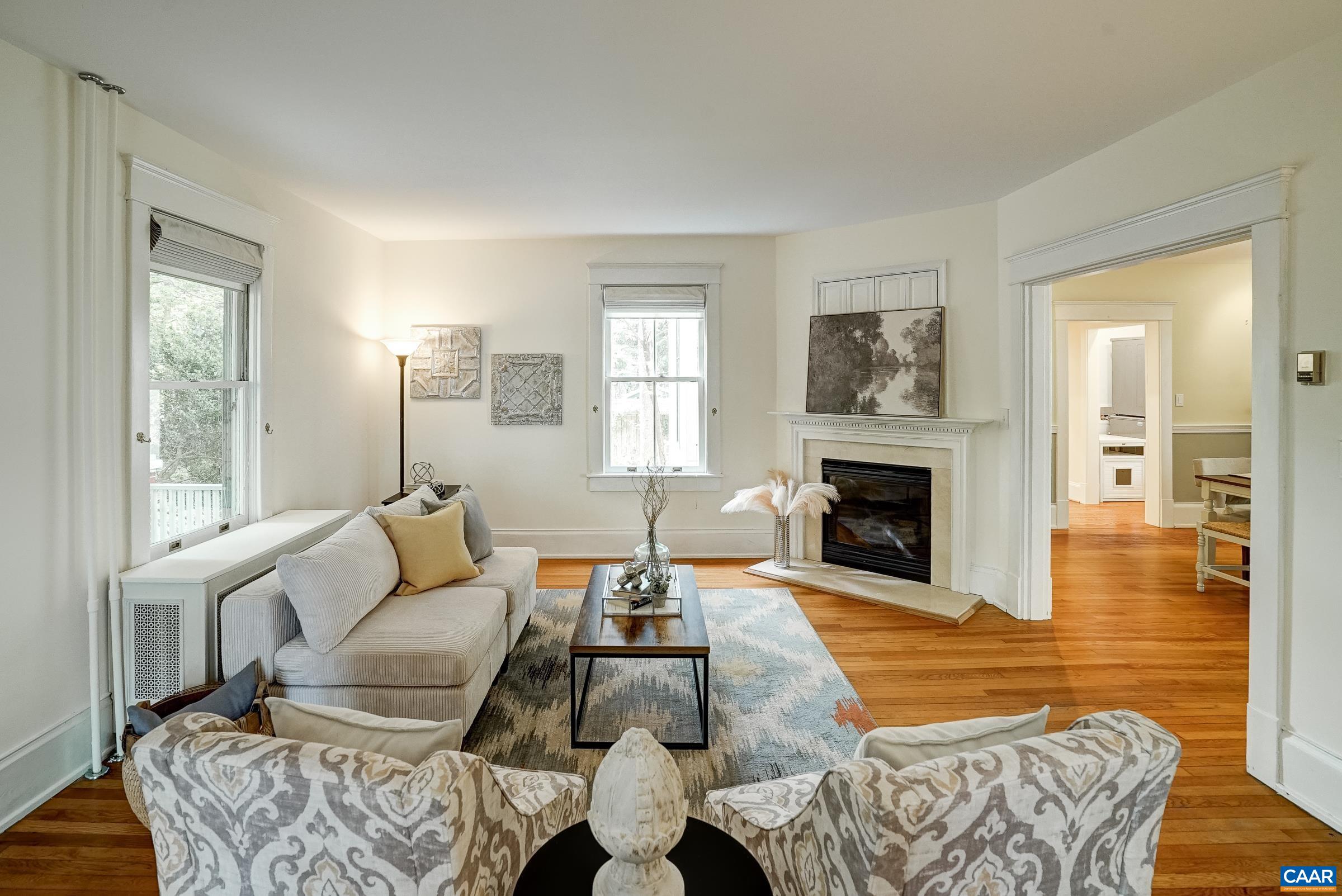 Freshly painted, large living room at the front of the home.