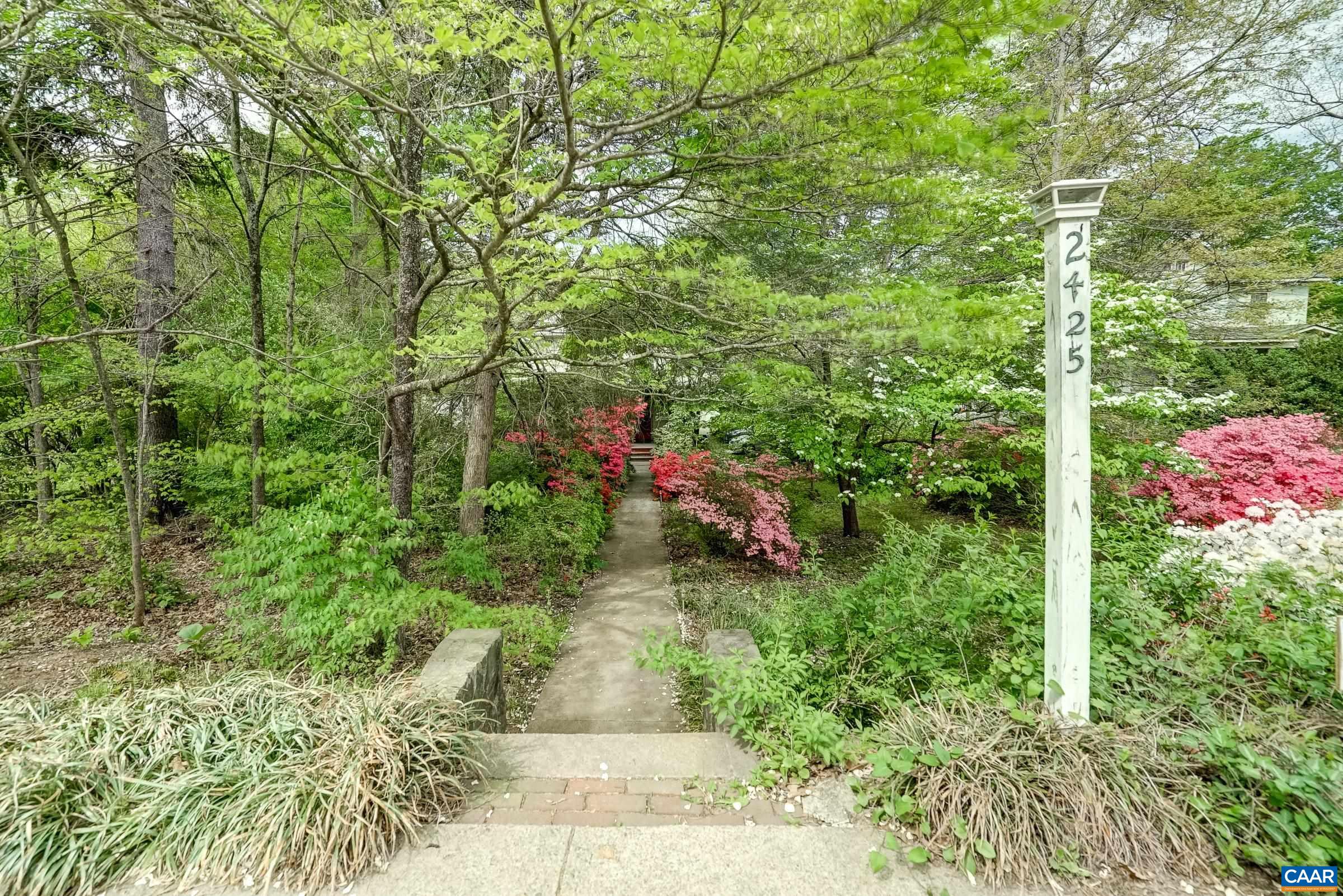 Lush landscaping provides privacy and color!