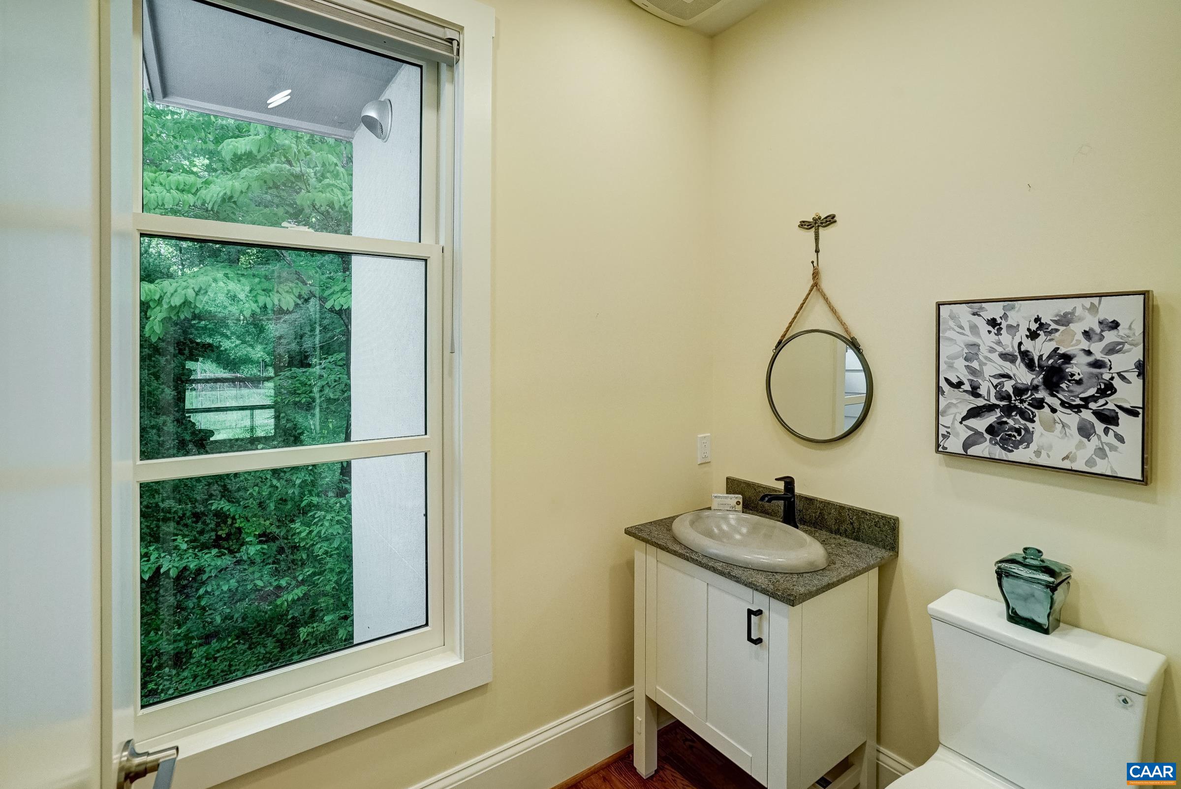 Renovated main level powder room.