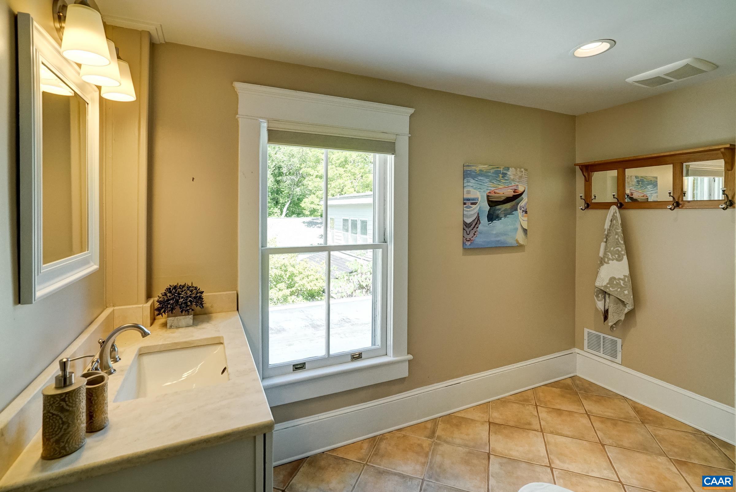 Renovated full bathroom.