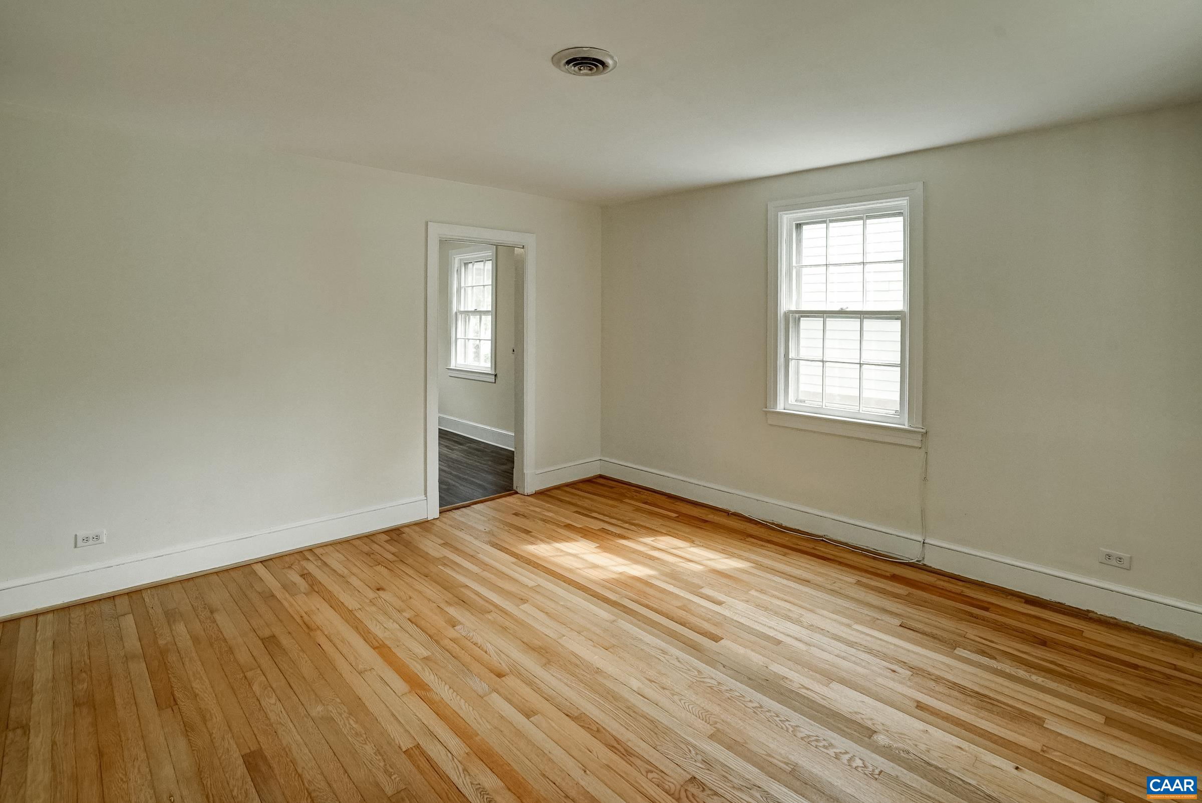 Cottage living room - original hardwoods in Living room and both bedrooms newly refinished in 2026
