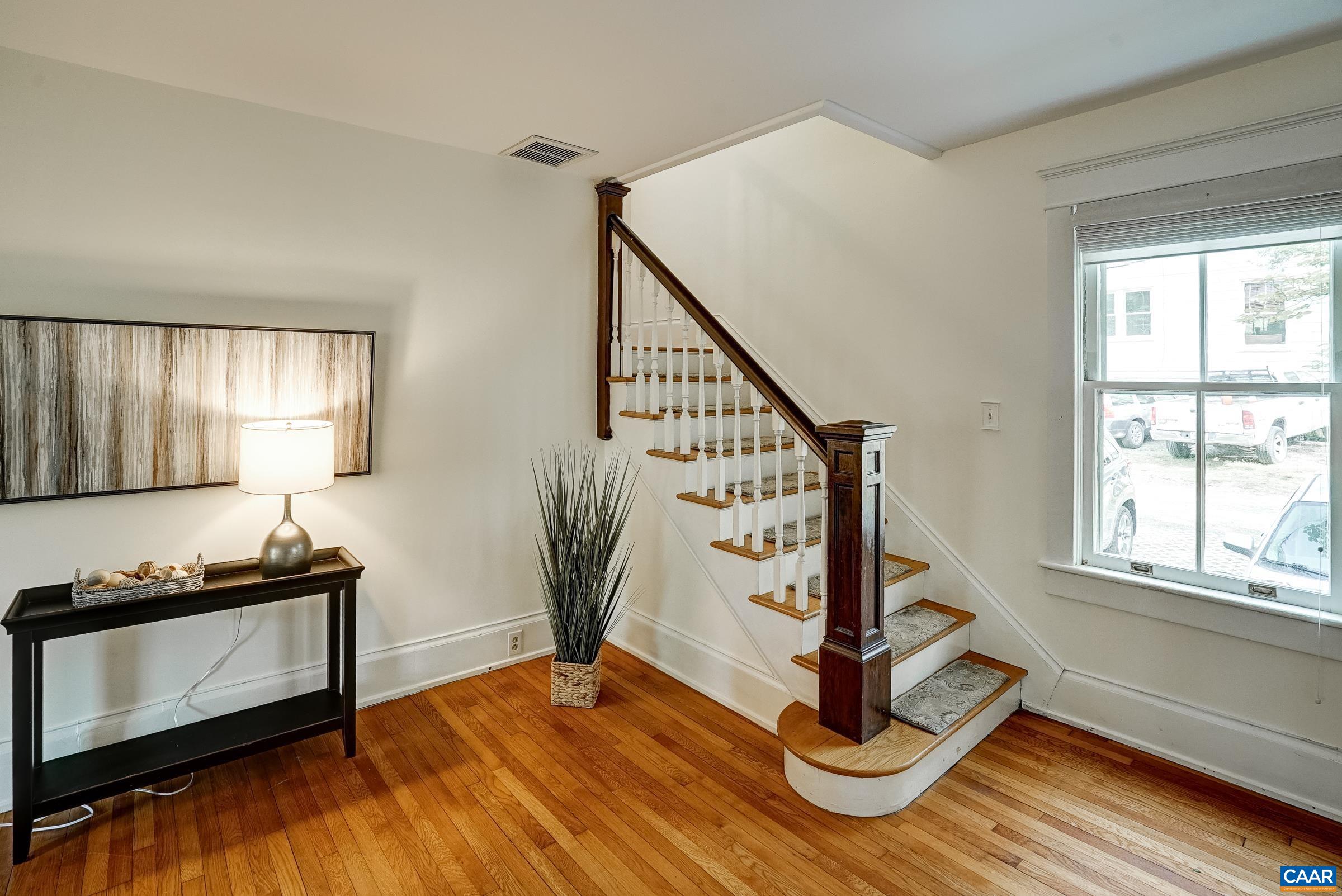 Hardwood floors and original detailing throughout the home.