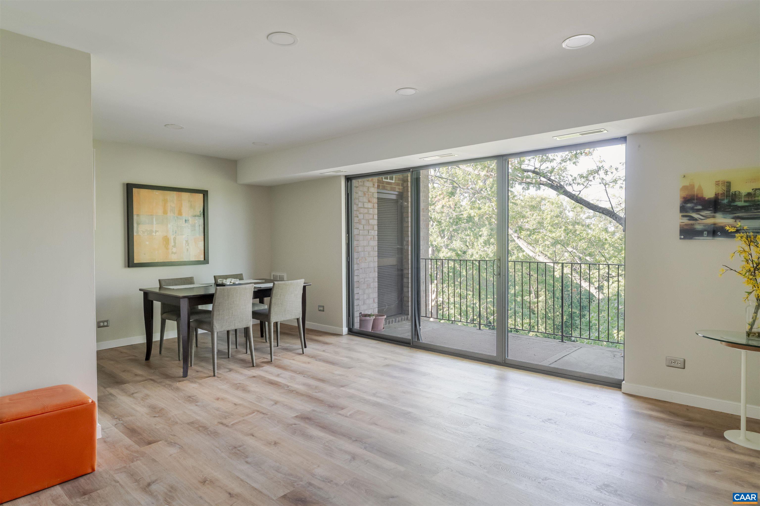 Sliding glass doors to private, covered balcony