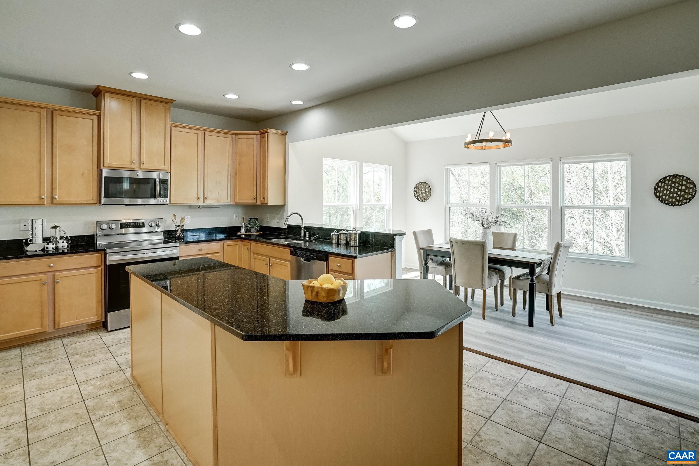 Large island worksurface with plenty of seating for casual dining.