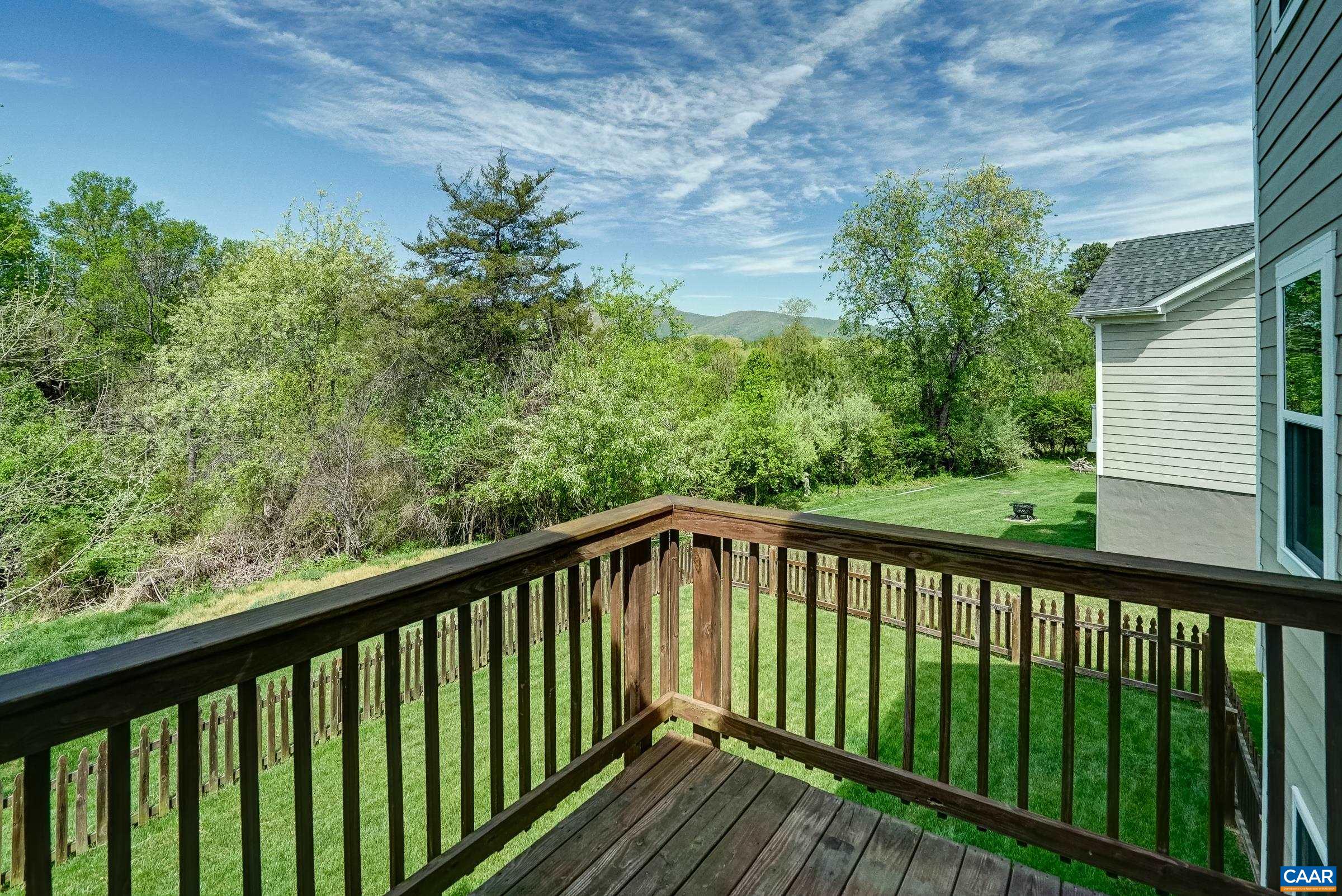 Deck for outdoor dining and grilling.