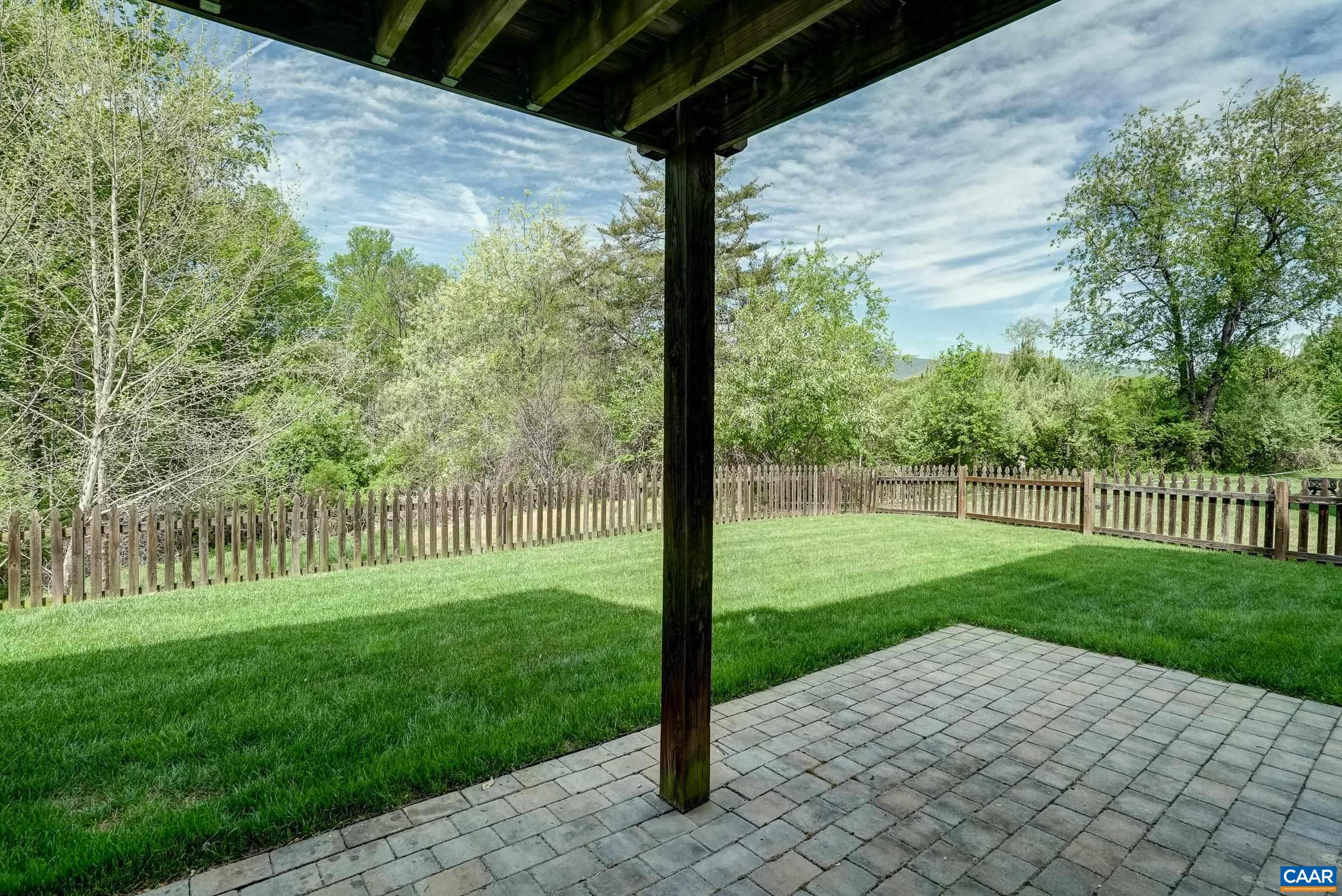 Paver patio beneath deck.