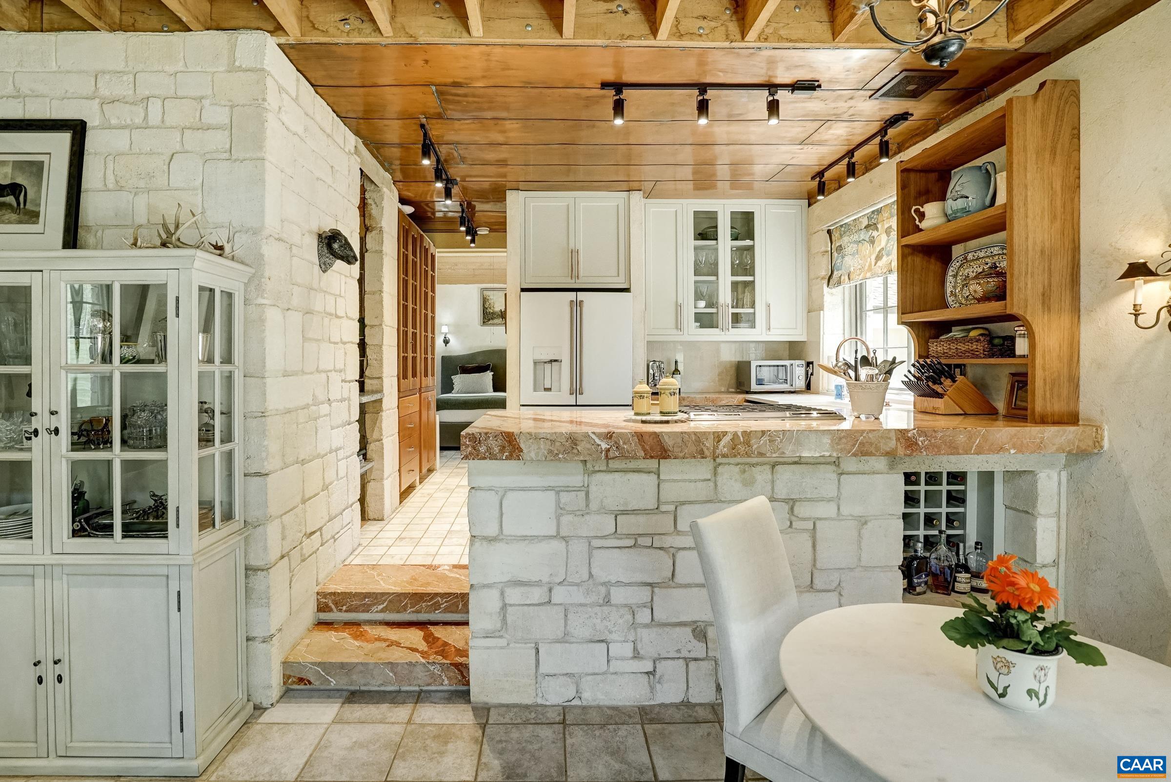 Cozy dining area with built-in wine storage!