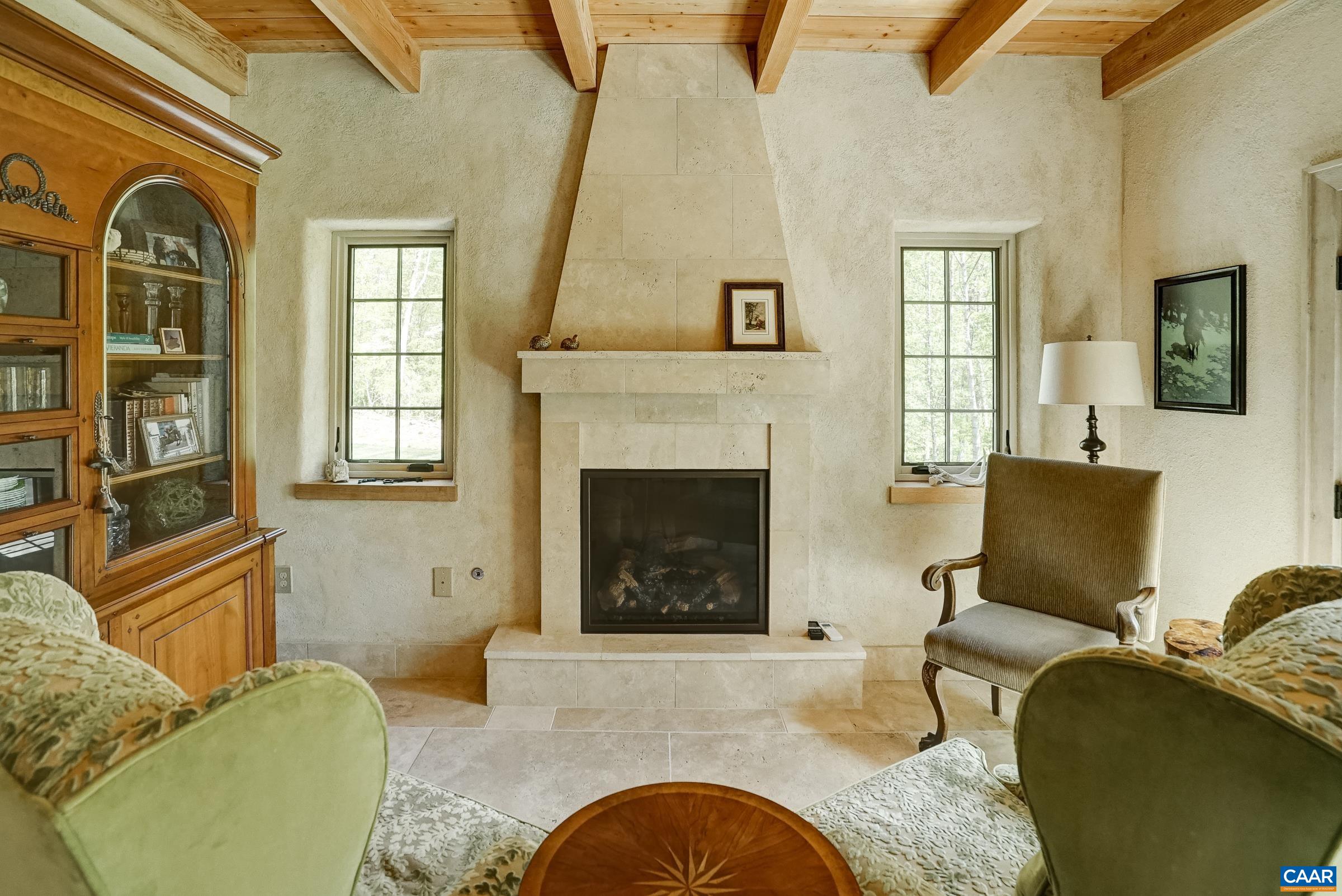 Gas fireplace inspired by main house fireplace.