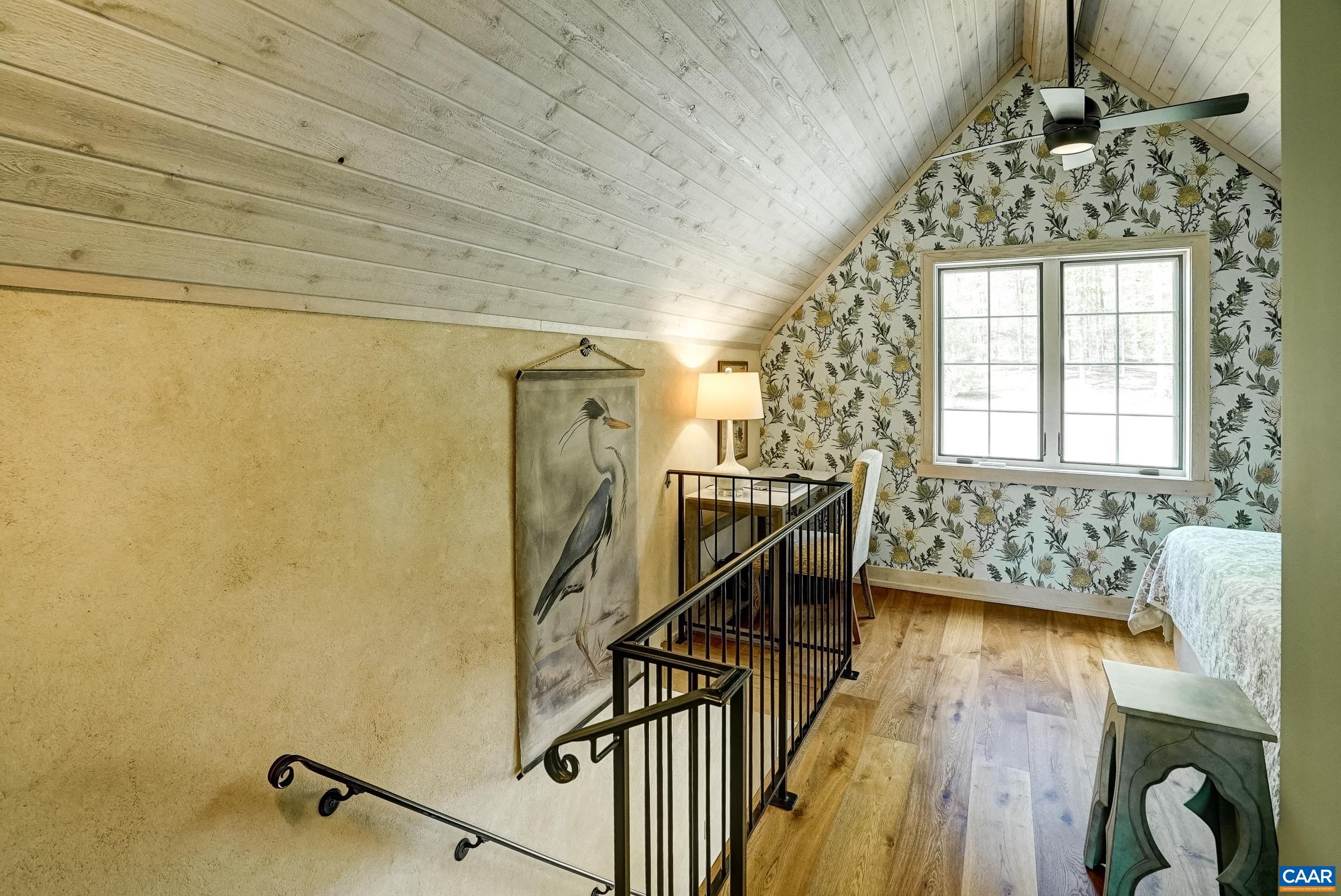 Upstairs is a flexible space that could be a home office, art studio or additional bedroom area.