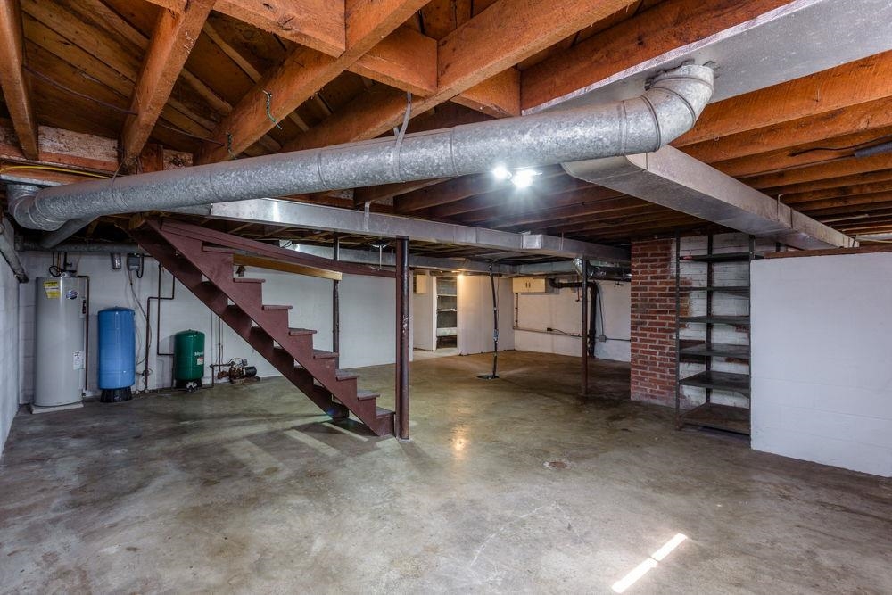 with mechanics room, outside entrance and storage.