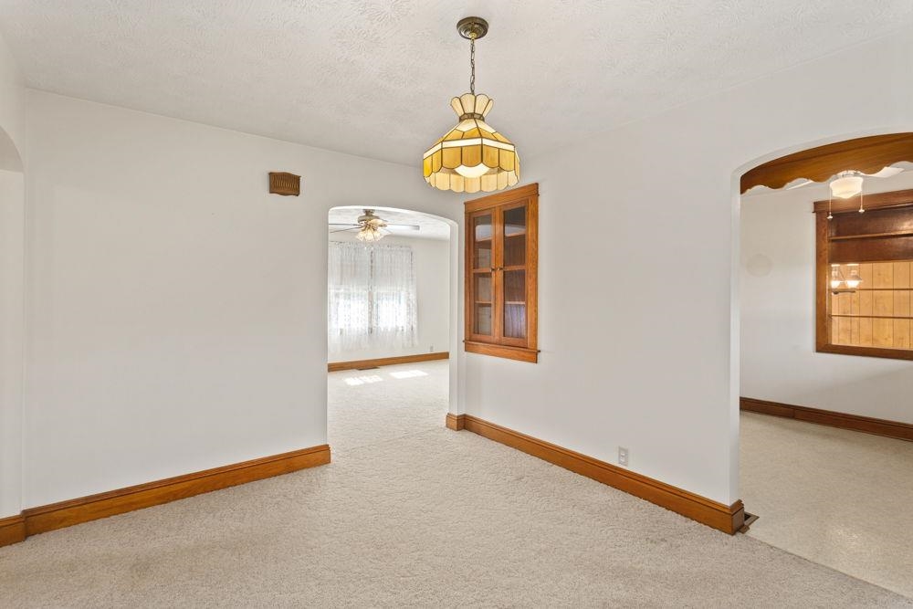 looking into the kitchen and living room.