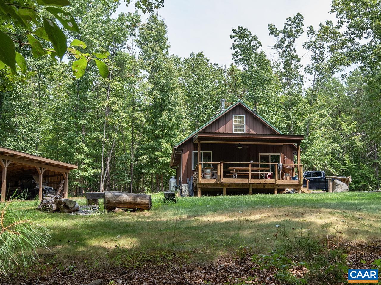 has two bathrooms and one large bedroom (bunk room style)