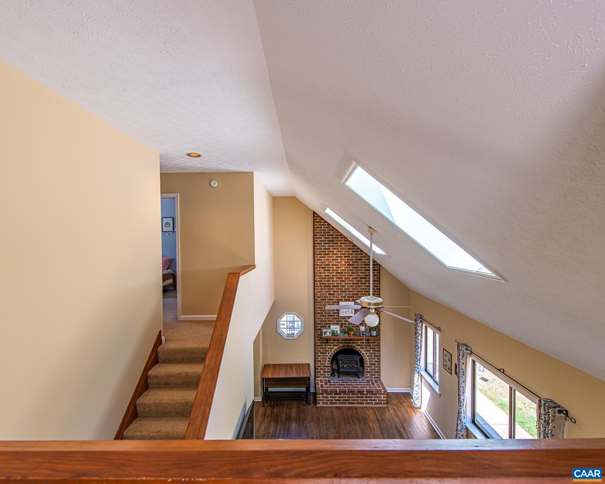 Overlooks Living & Dining Room Below