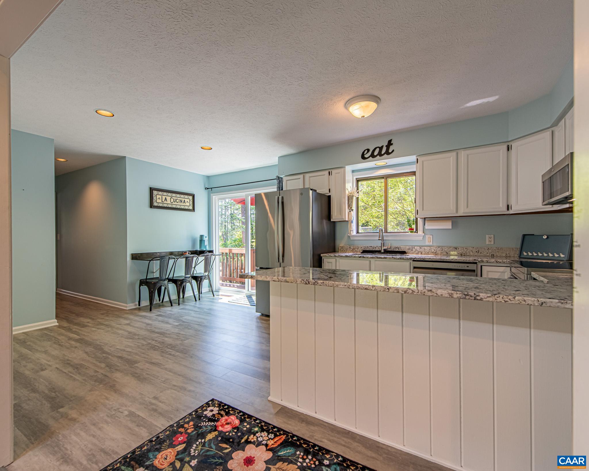 Fully Renovated Kitchen - Painted Cabinets, Granite Countertop, New Appliances, New LVP Flooring