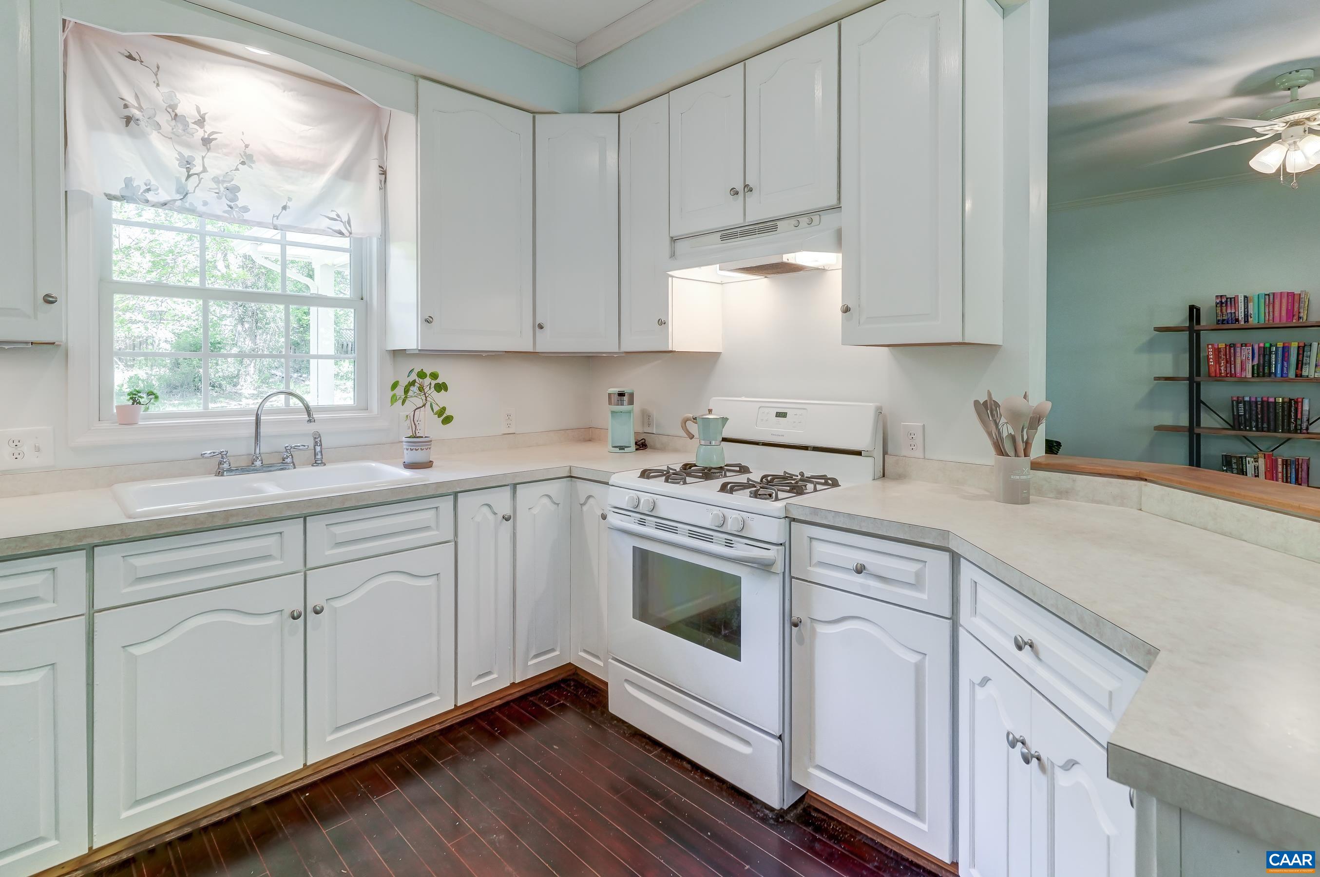 White cabinets and appliances.