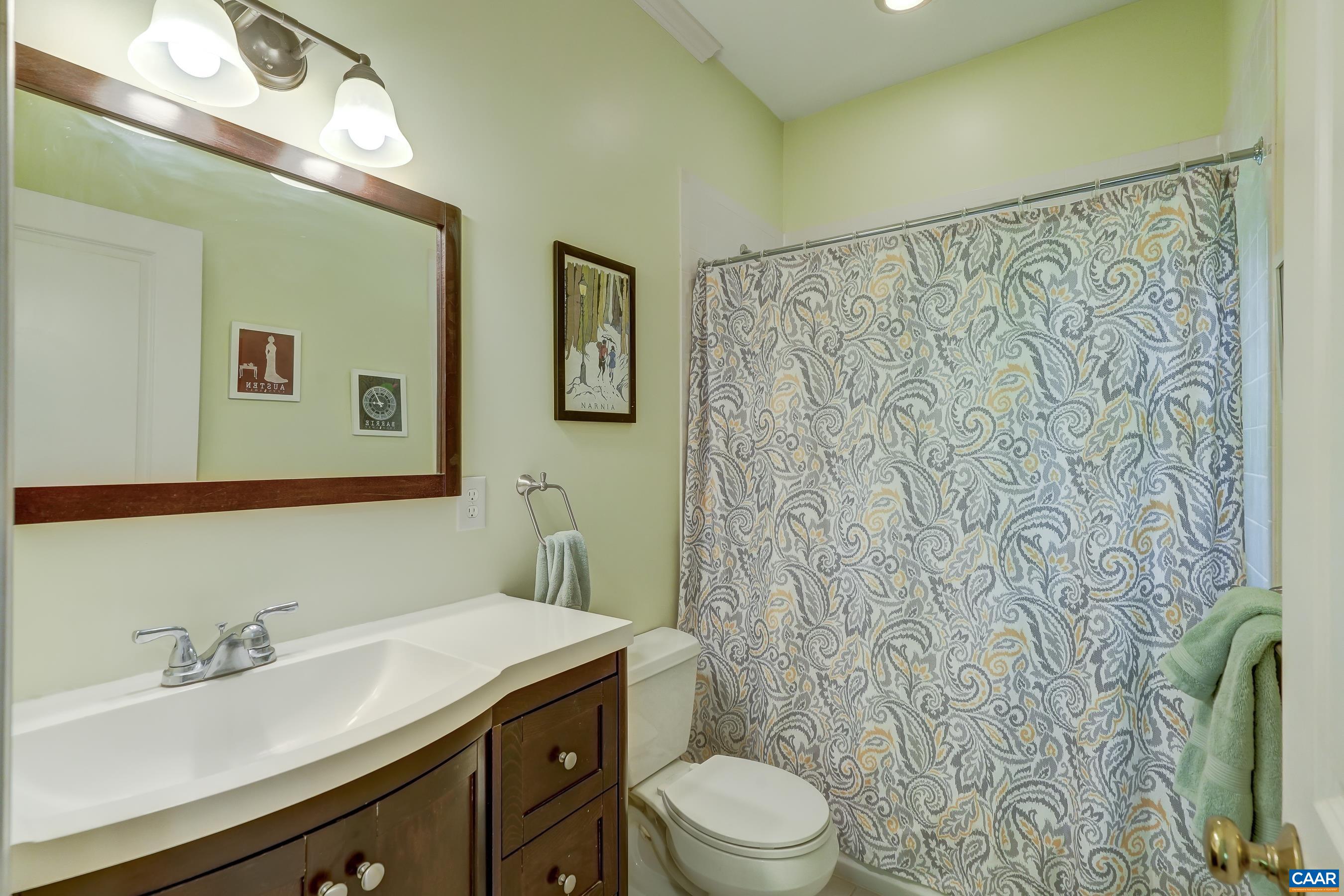 Full bathroom with tub/shower.