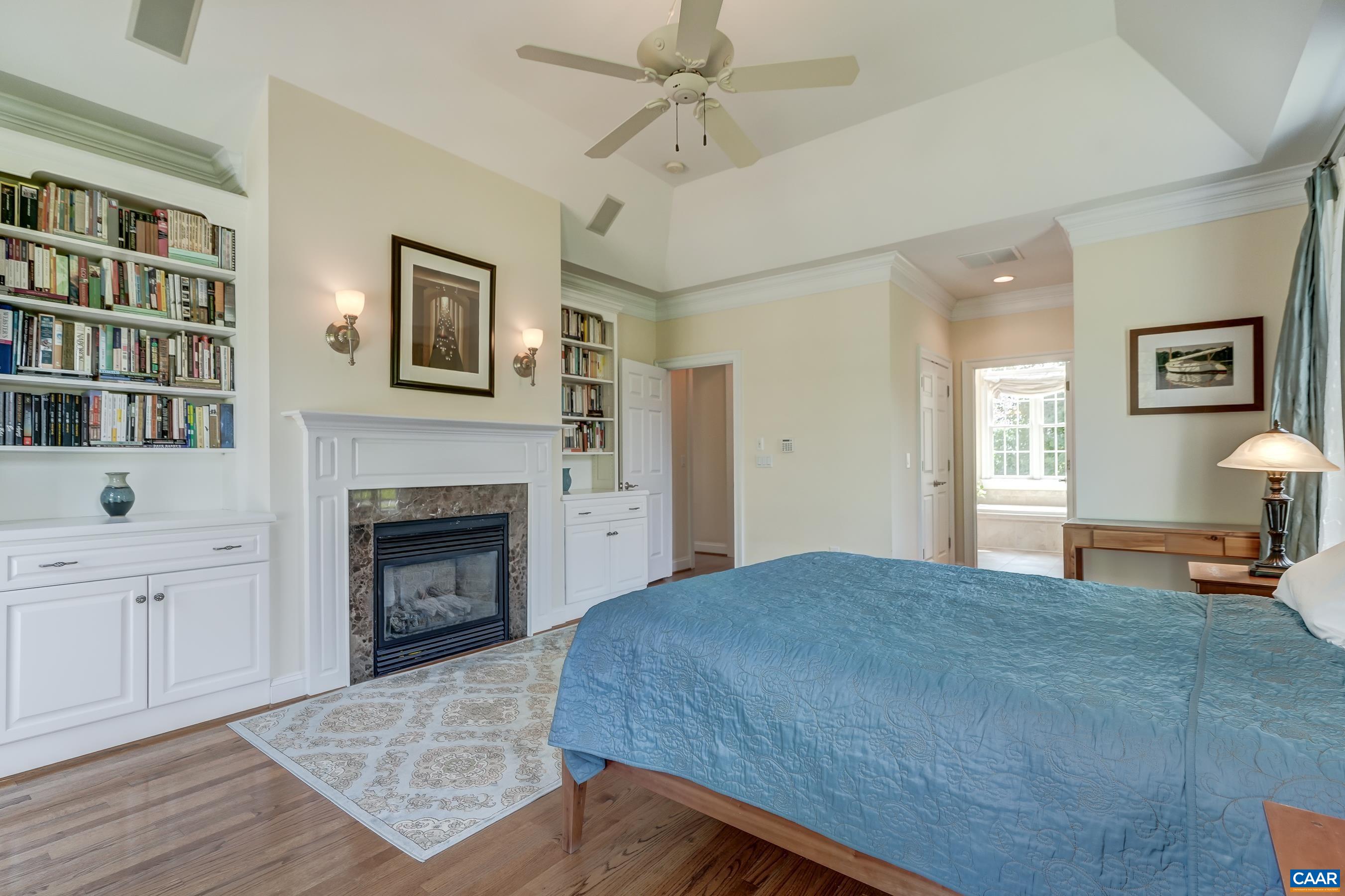 Custom built ins flank fireplace