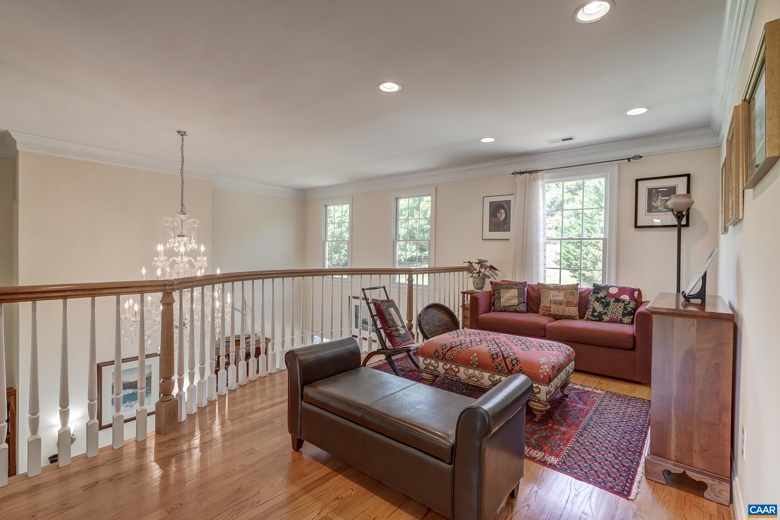 Sitting area overlooks great room below.