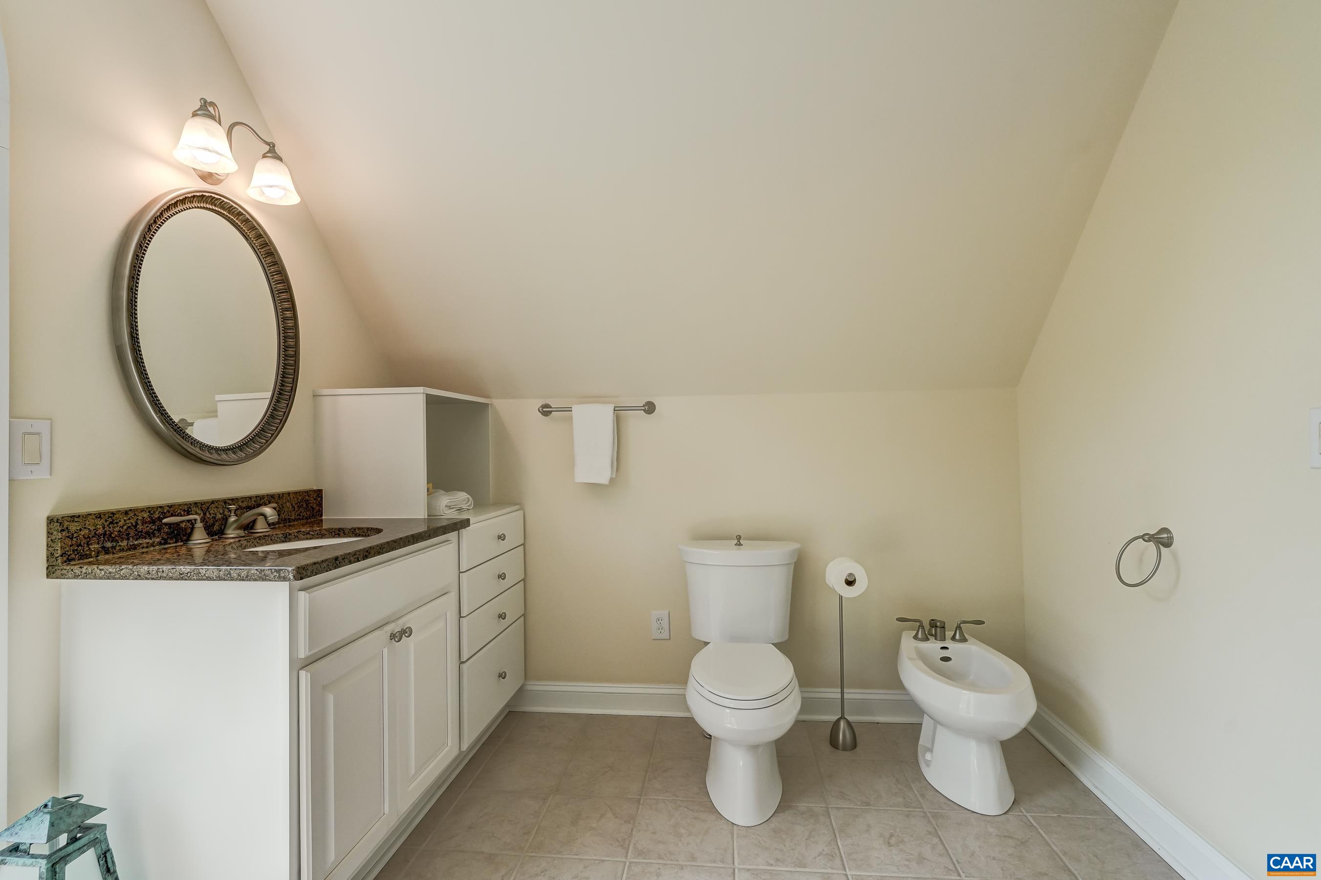 Second floor ensuite bathroom with bidet.