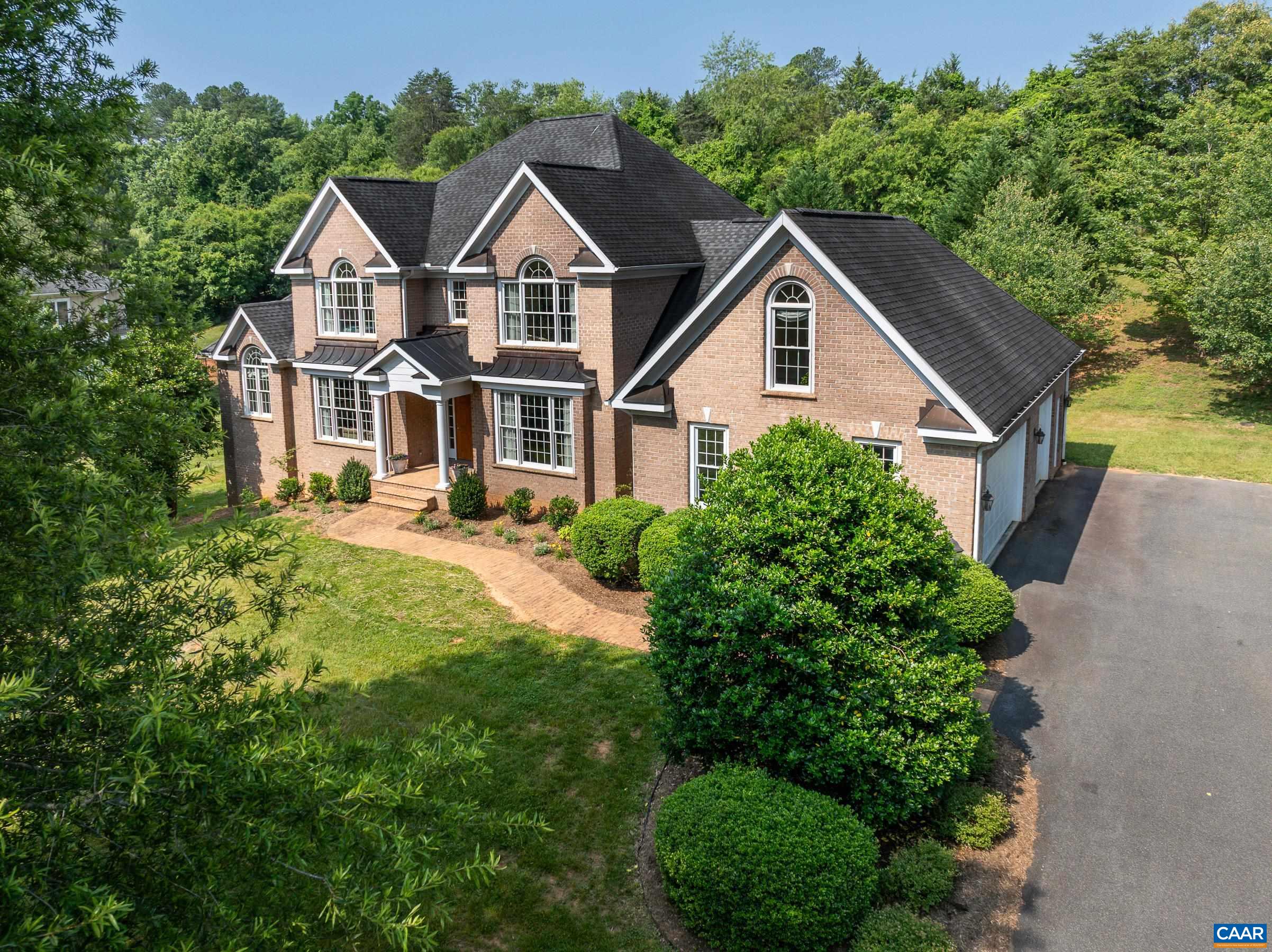Stunning brick home in Foxchase. Current owners have landscaping drawings that include space for a private pool in the rear.