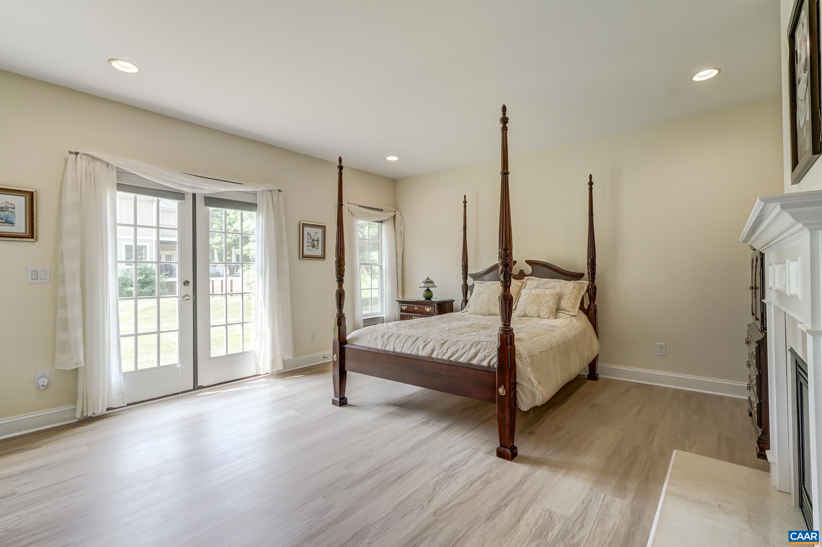 Guest suite with outside access in basement features a gas fireplace!