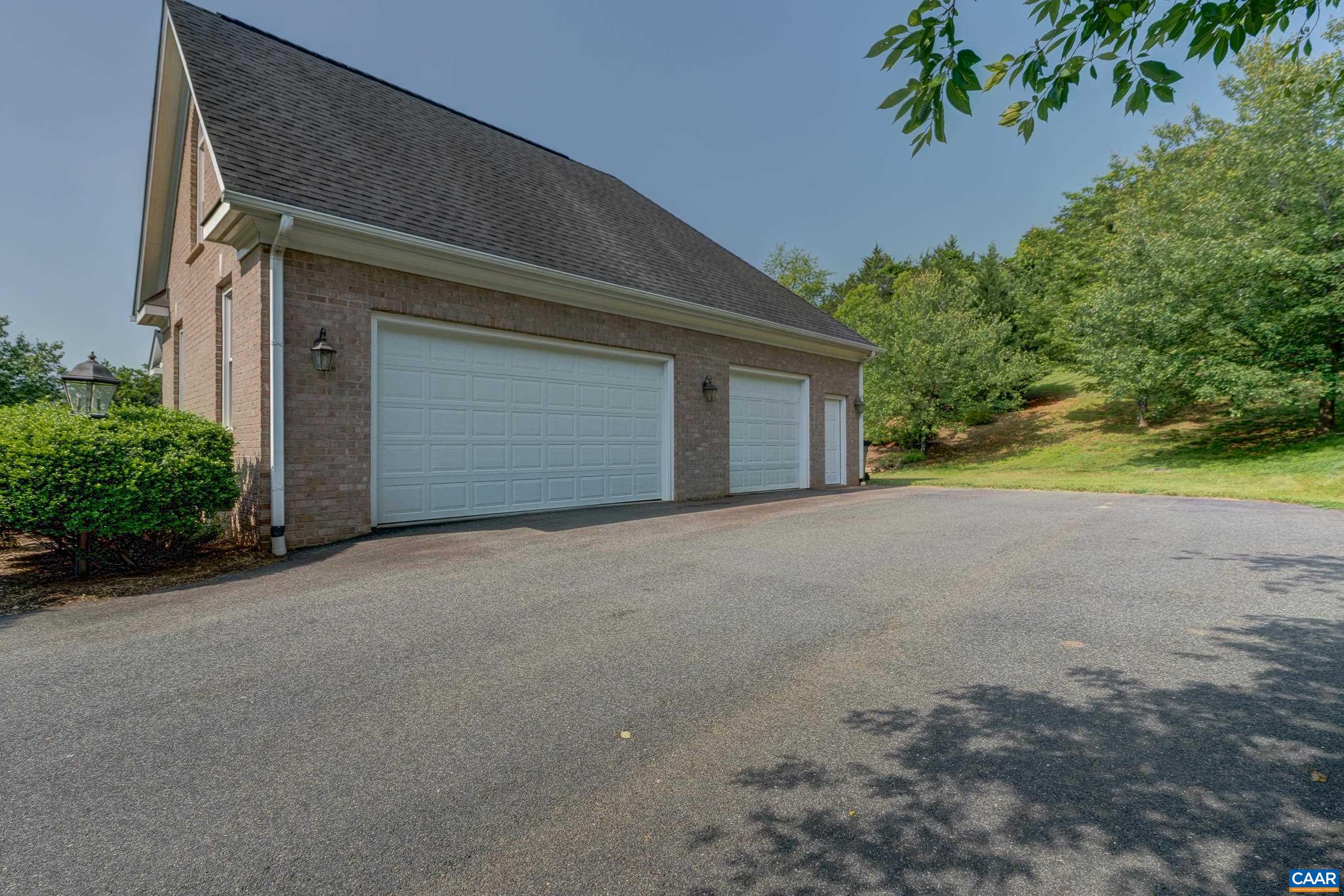 Three car garage with extra storage!
