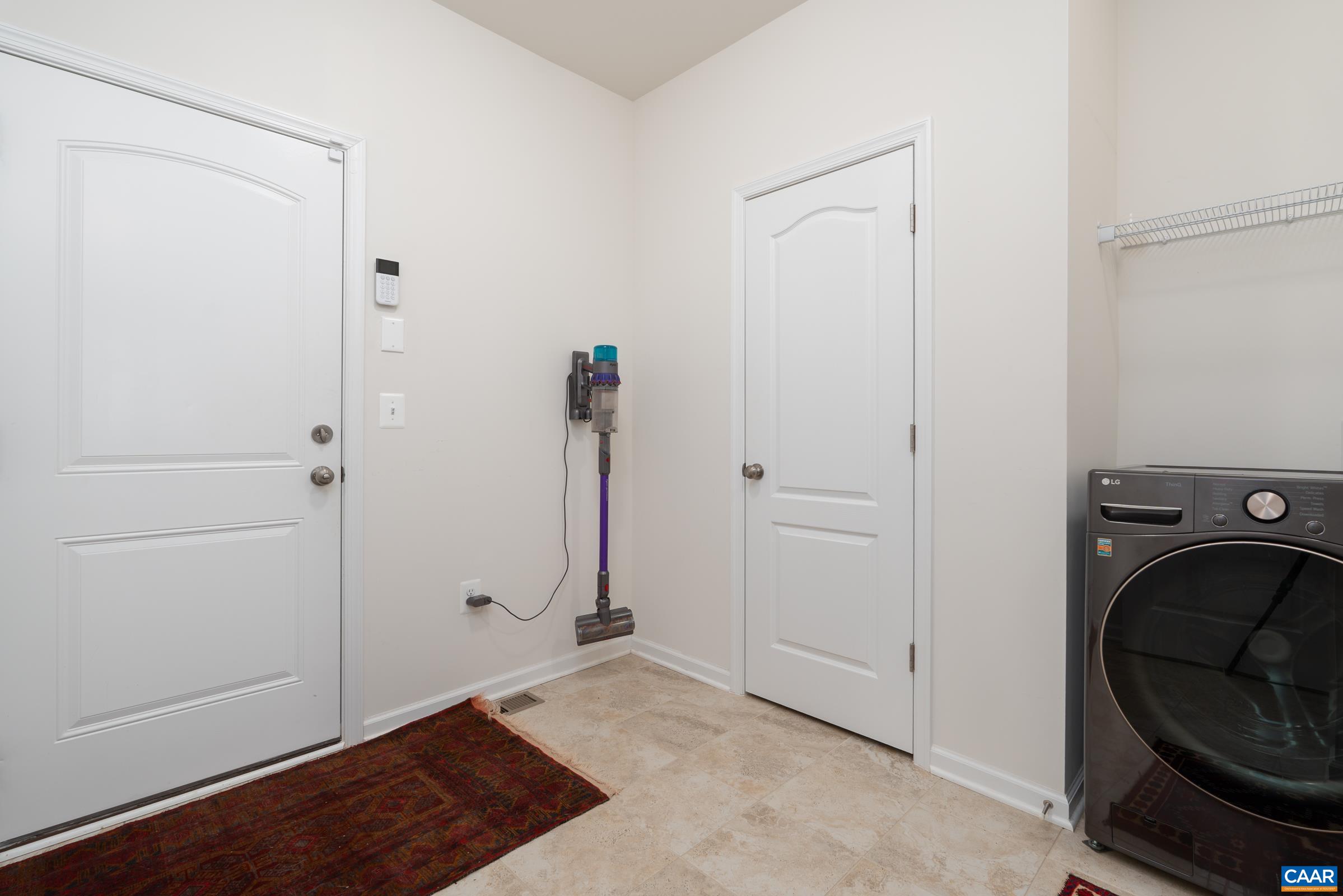 1st floor laundry with closet and garage entry