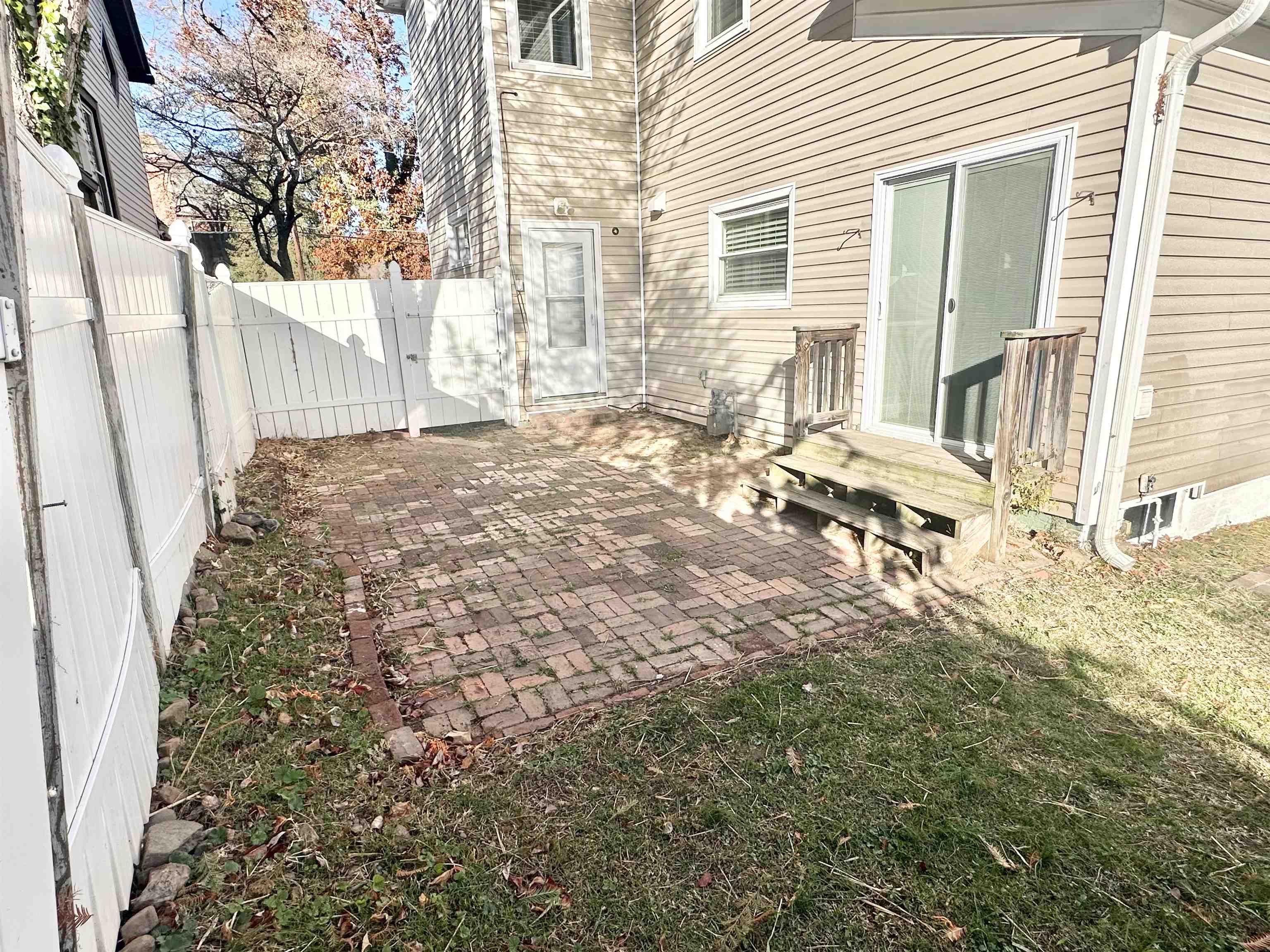 brick patio and completely fenced